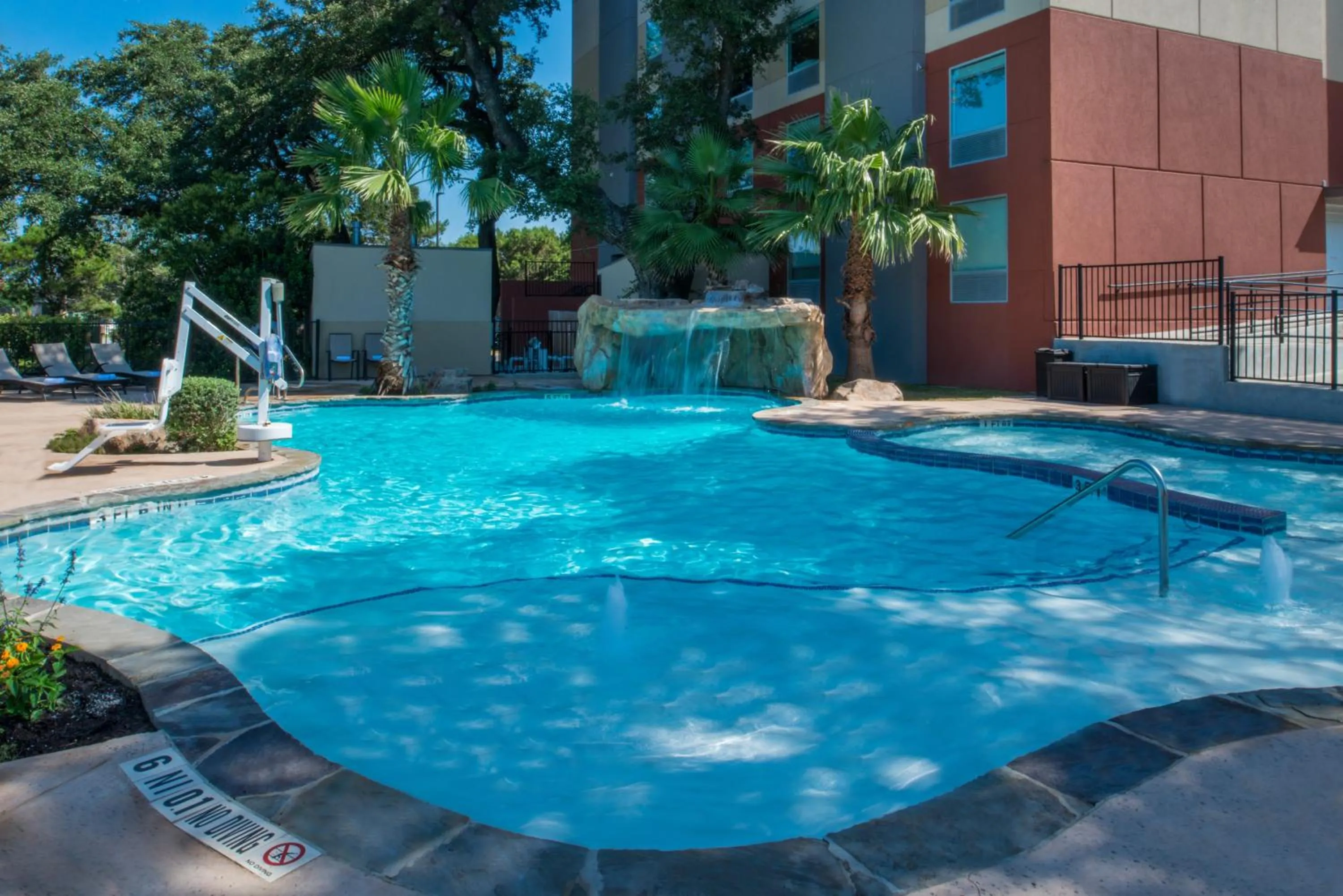Swimming pool in Holiday Inn Express & Suites San Antonio Medical - Six Flags by IHG