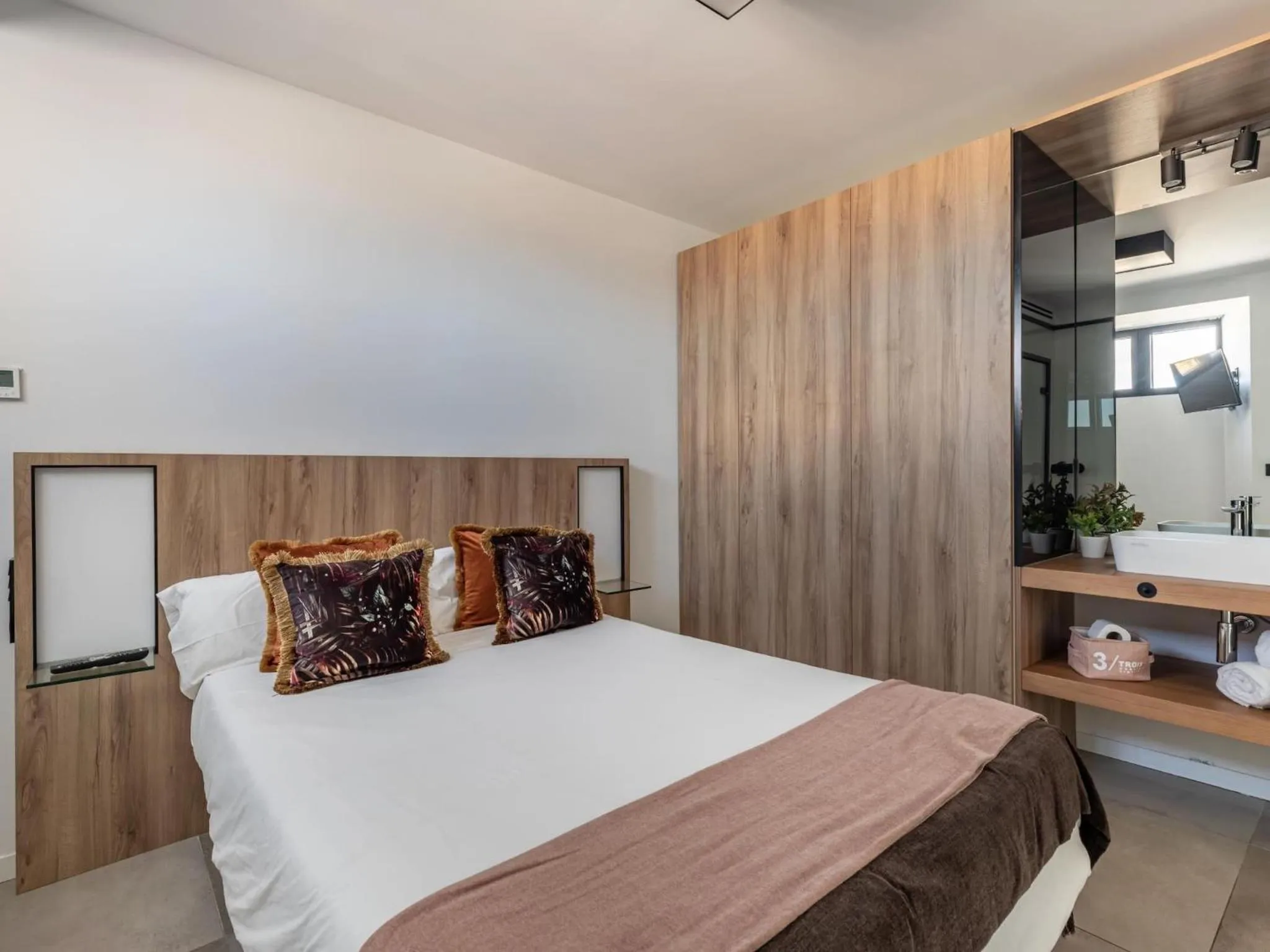 Bed in ChezmoiHomes Luxury Alhambra Penthouse Collection