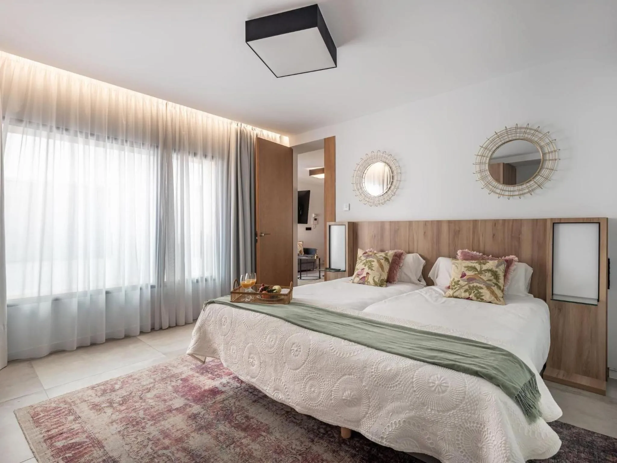 Bed in ChezmoiHomes Luxury Alhambra Penthouse Collection