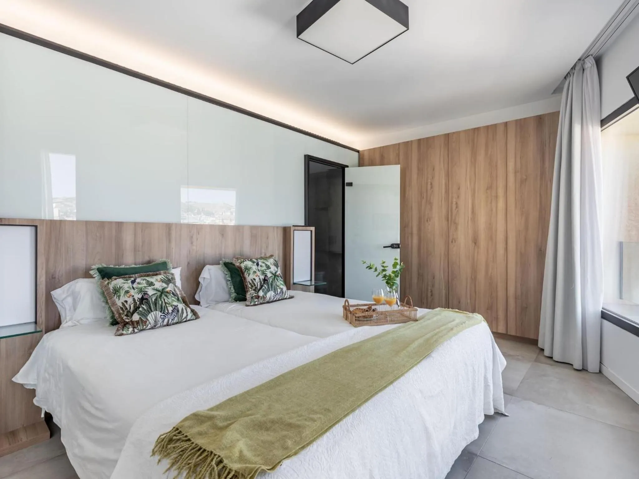 Bed in ChezmoiHomes Luxury Alhambra Penthouse Collection