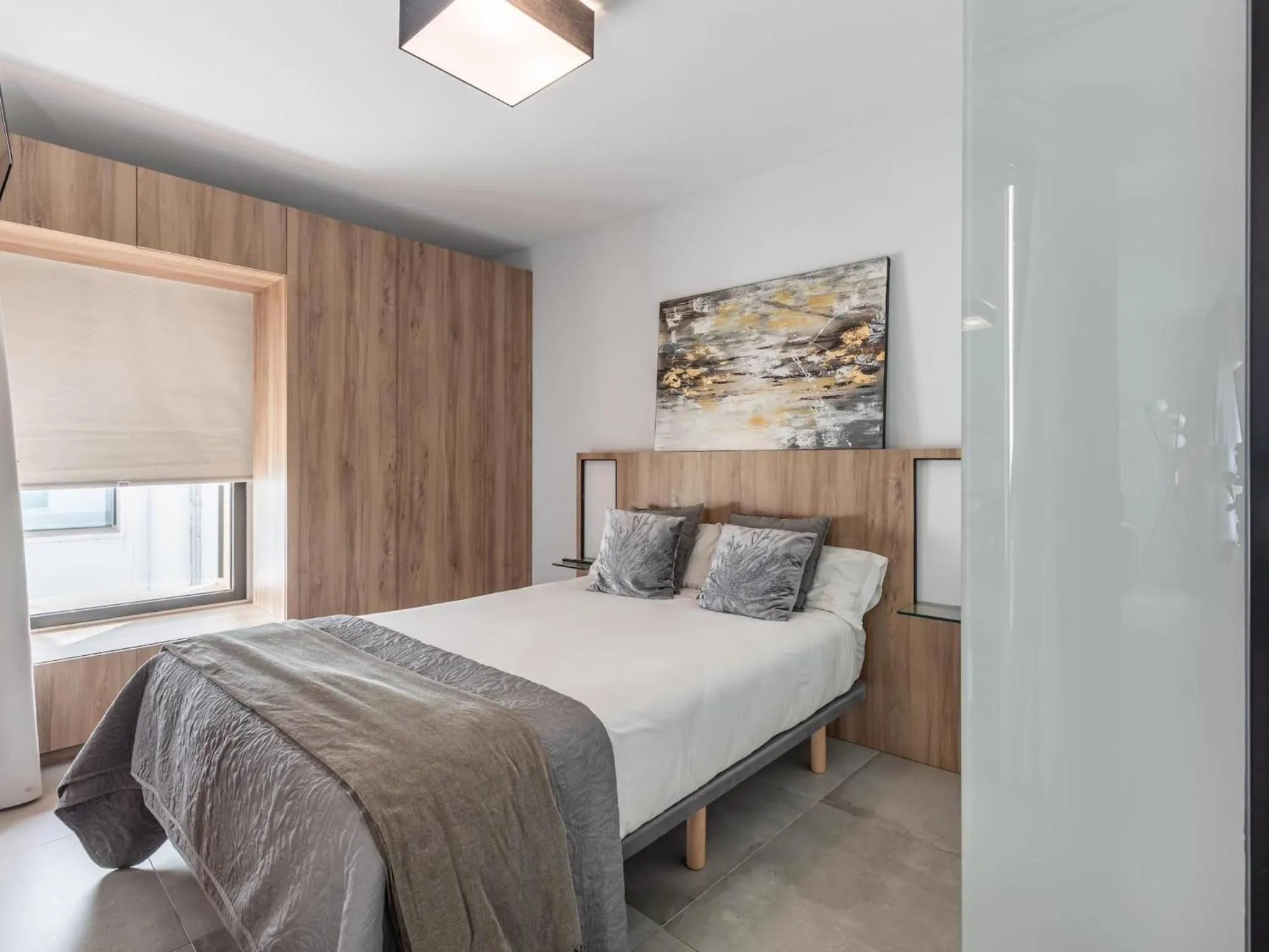 Bed in ChezmoiHomes Luxury Alhambra Penthouse Collection