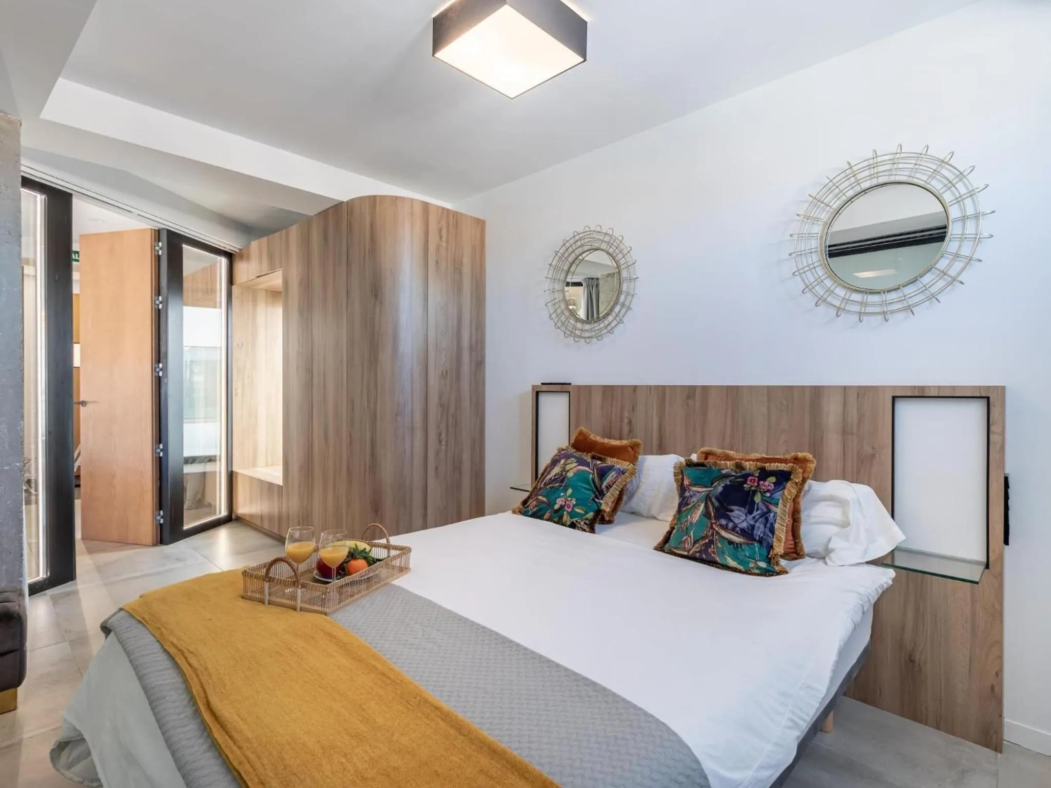 Bed in ChezmoiHomes Luxury Alhambra Penthouse Collection