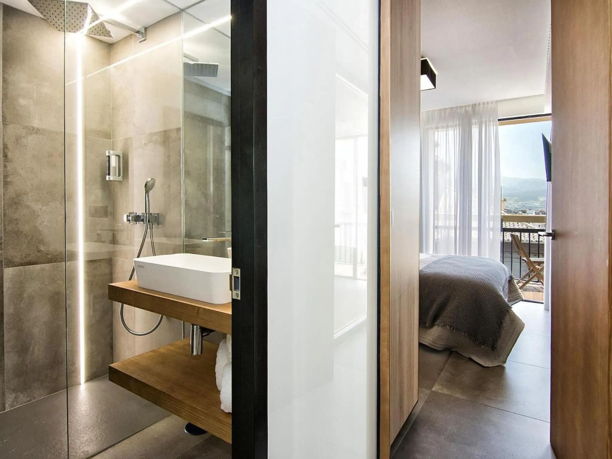Shower, Bed in ChezmoiHomes Luxury Alhambra Penthouse Collection