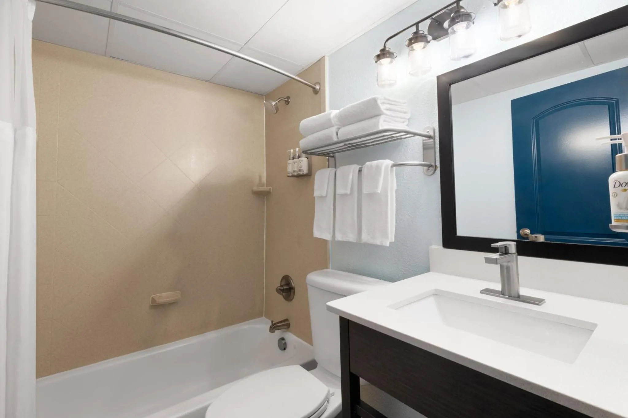 Bathroom in Garner Hotel Virginia Beach North by IHG