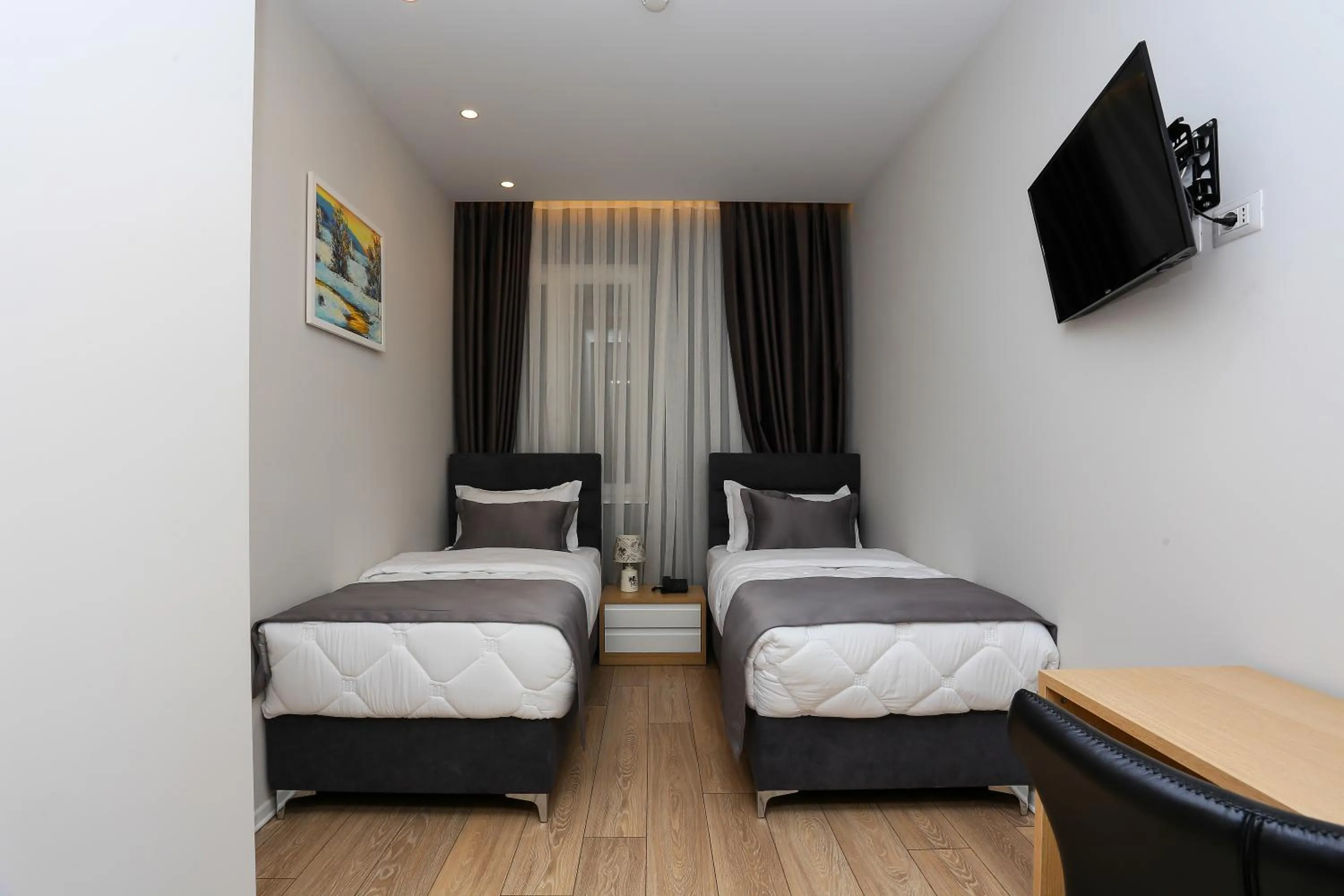 Bed in Emerald Boutique Hotel