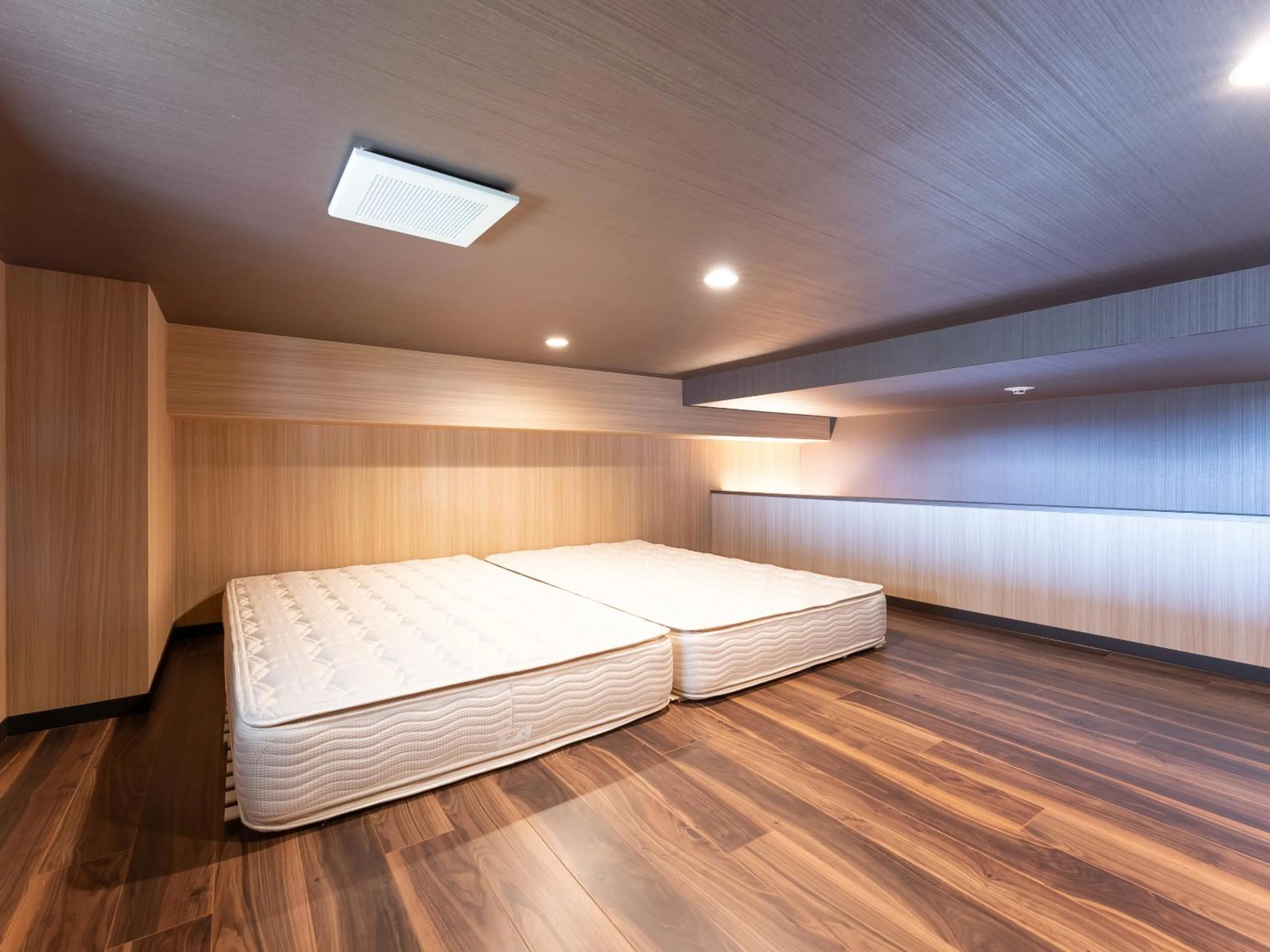 Bed in LiVEMAX RESORT Sakurajima Sea Front