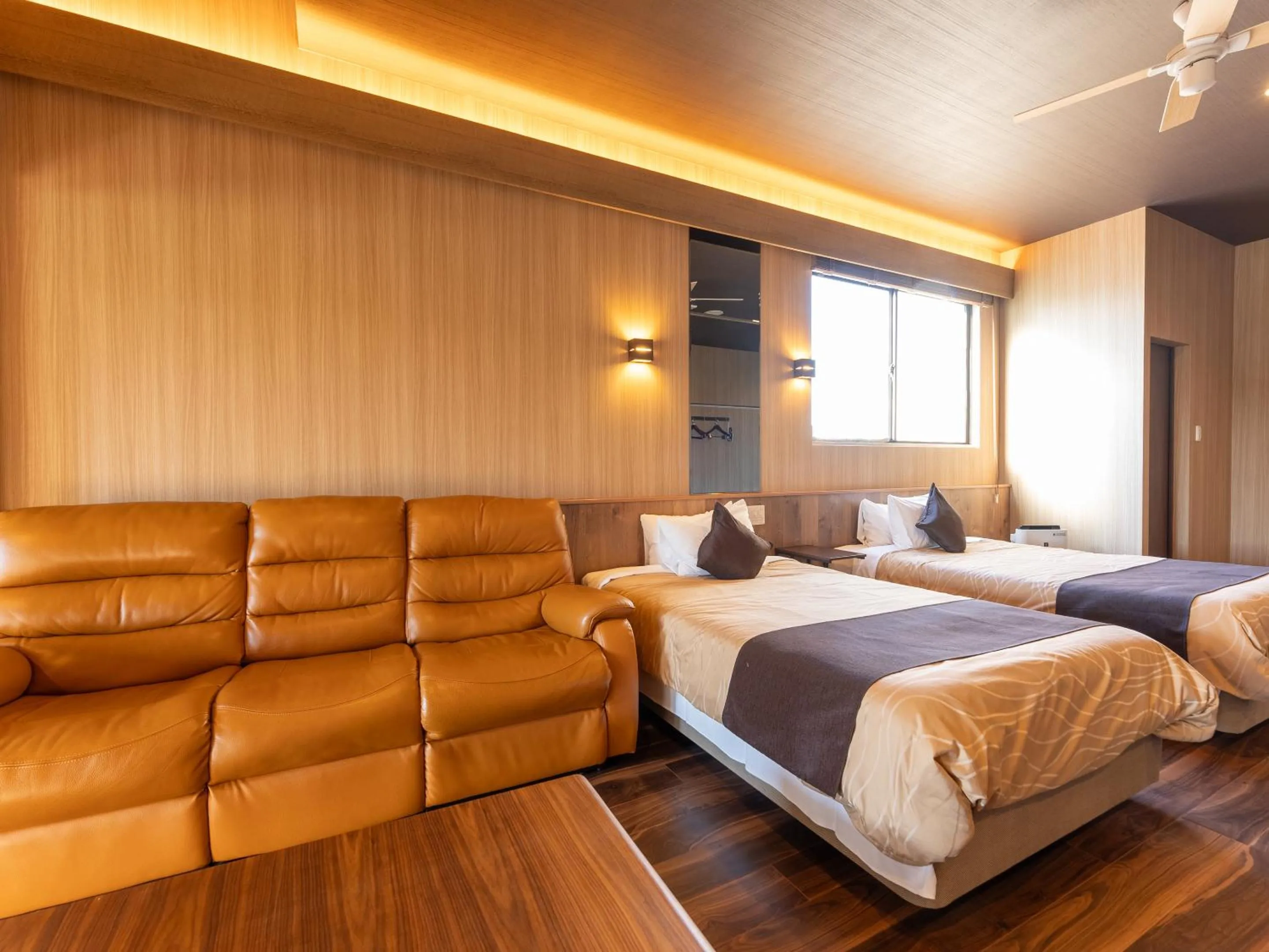 Bed in LiVEMAX RESORT Sakurajima Sea Front