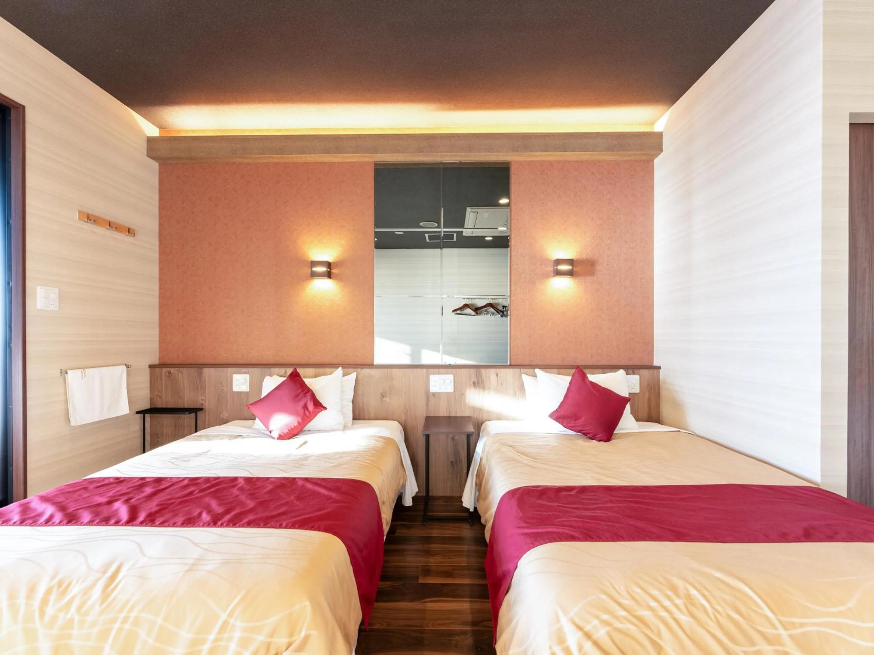 Bed in LiVEMAX RESORT Sakurajima Sea Front