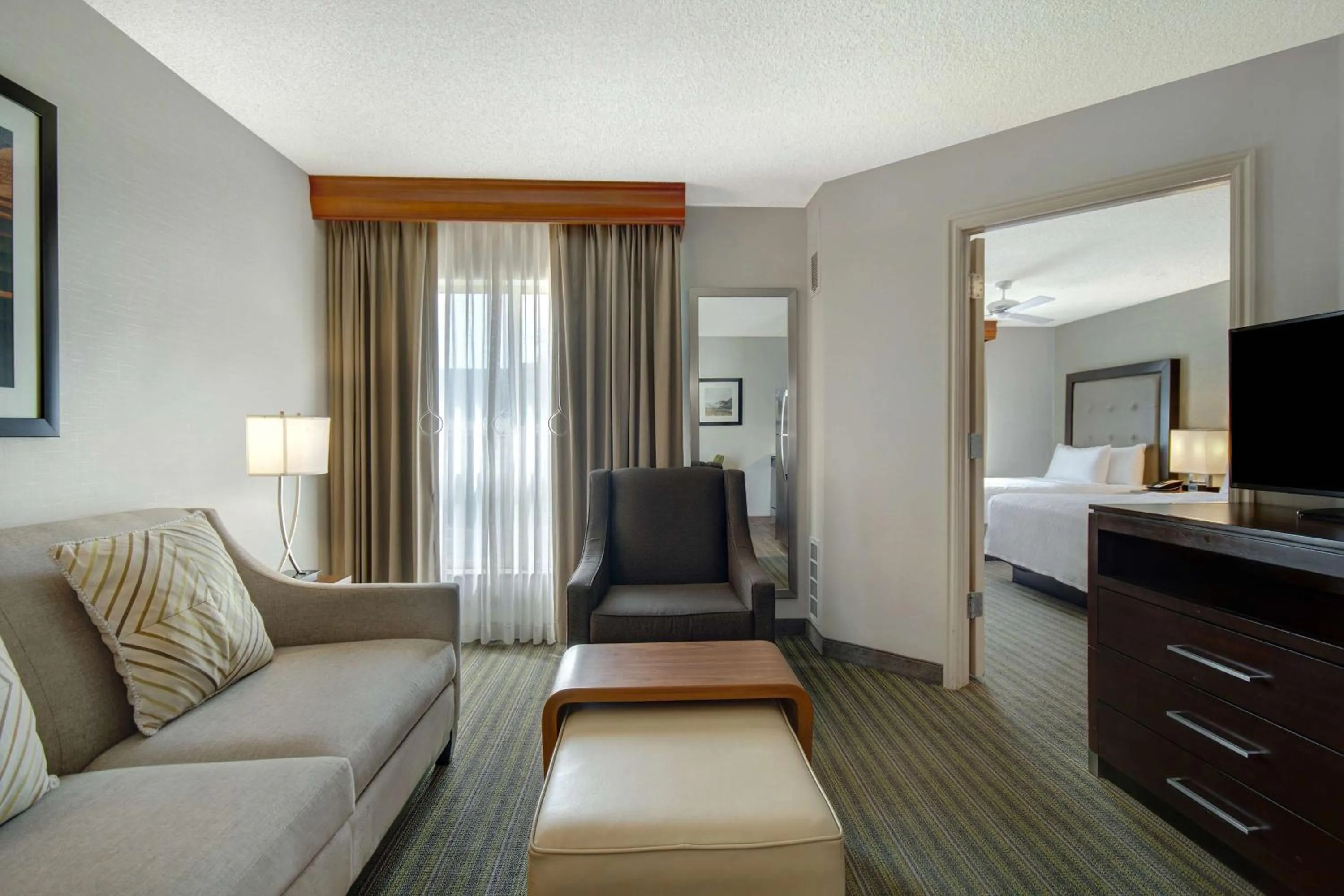 Living room, Bed in Homewood Suites by Hilton Salt Lake City - Midvale/Sandy