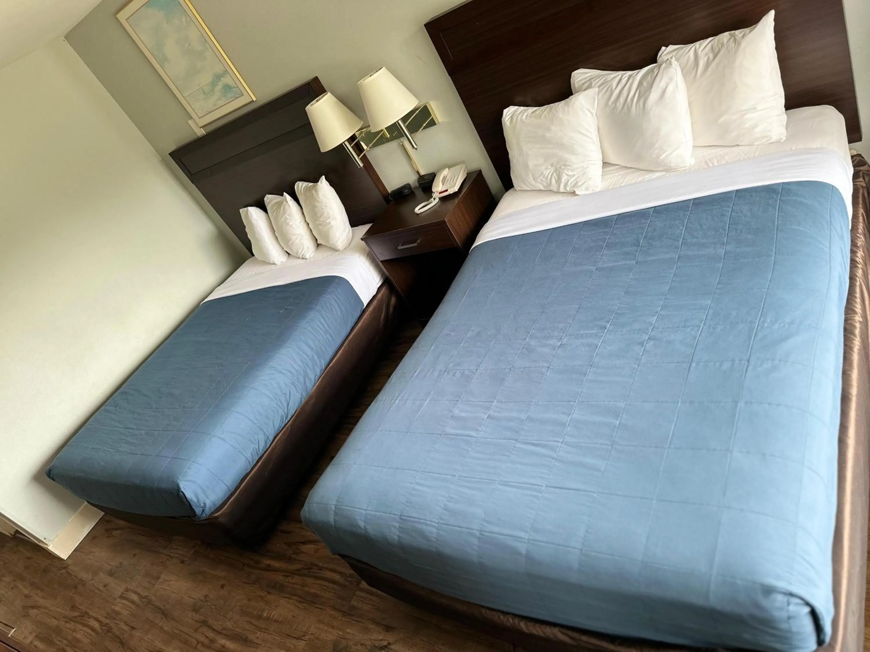 Bed in Coratel Inn and Suites By Jasper Ocean Shores