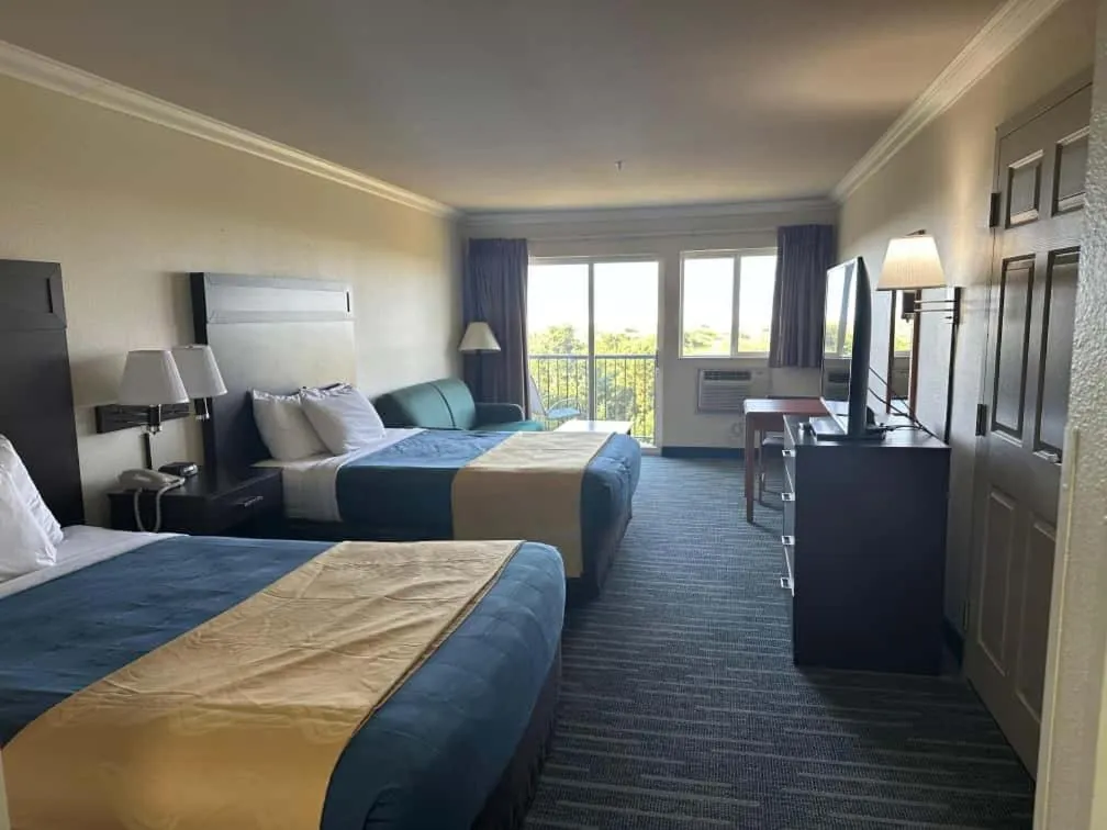 Bed in Coratel Inn and Suites By Jasper Ocean Shores