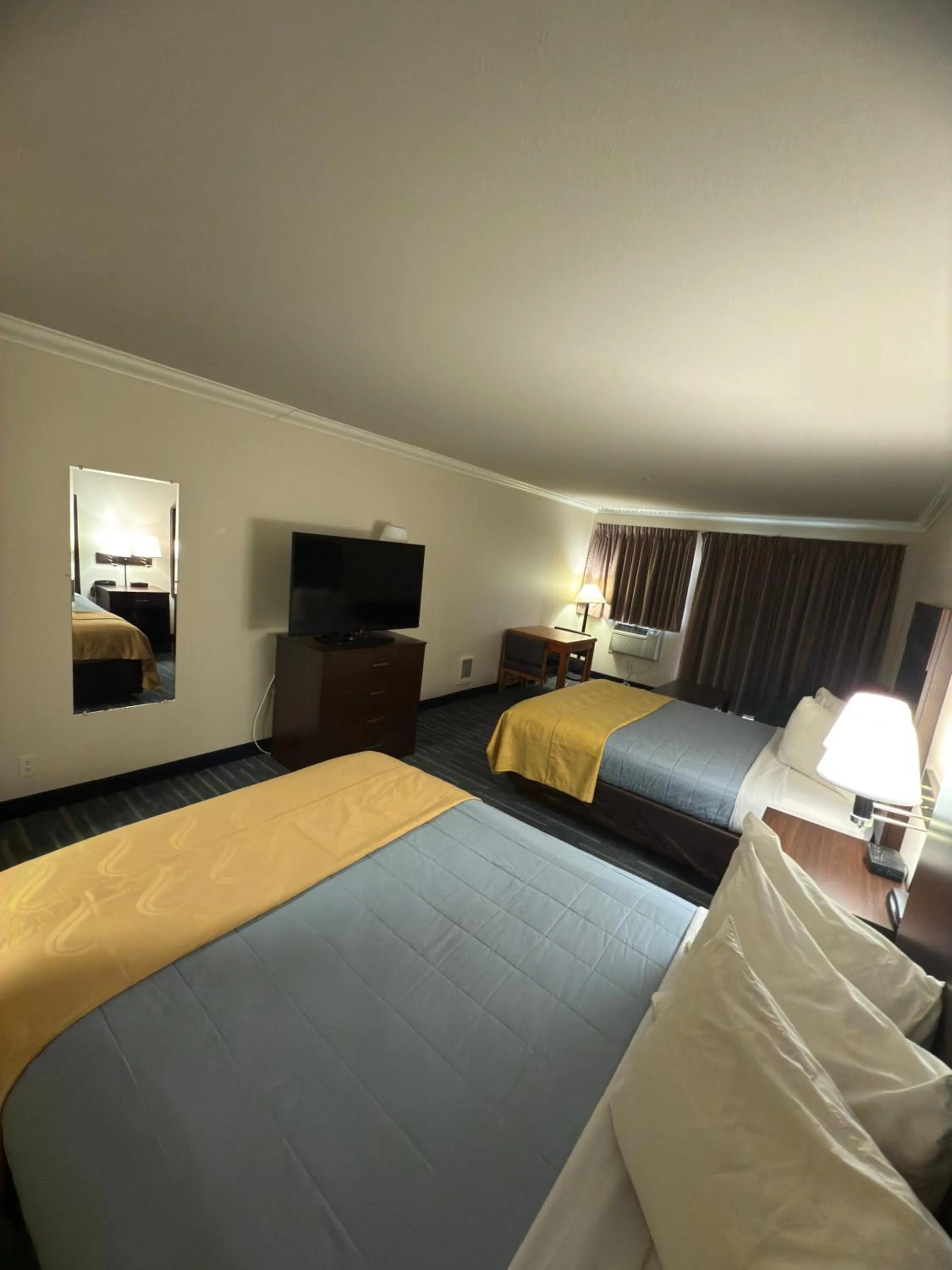 Bed in Coratel Inn and Suites By Jasper Ocean Shores