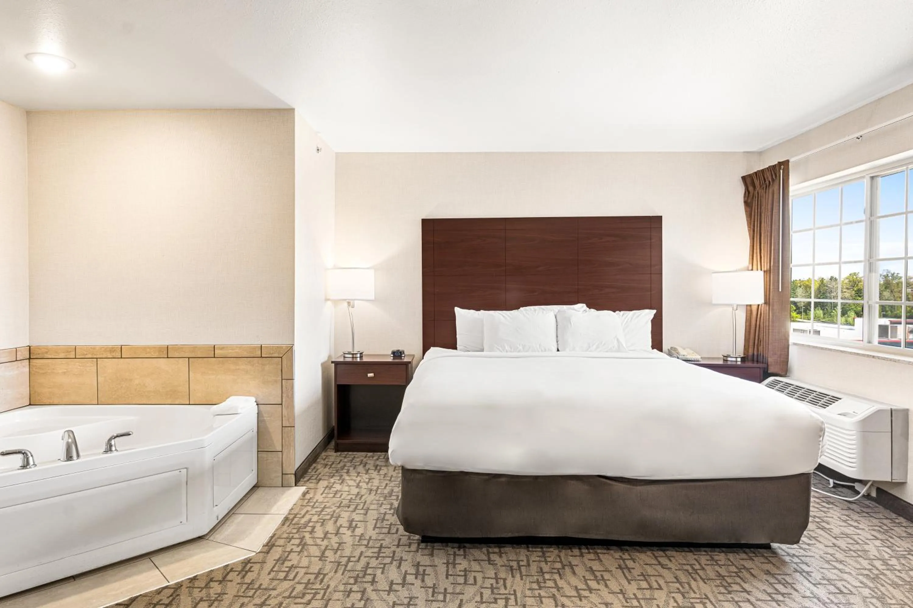 Photo of the whole room, Bed in Boarders Inn & Suites by Cobblestone Hotels - Shawano