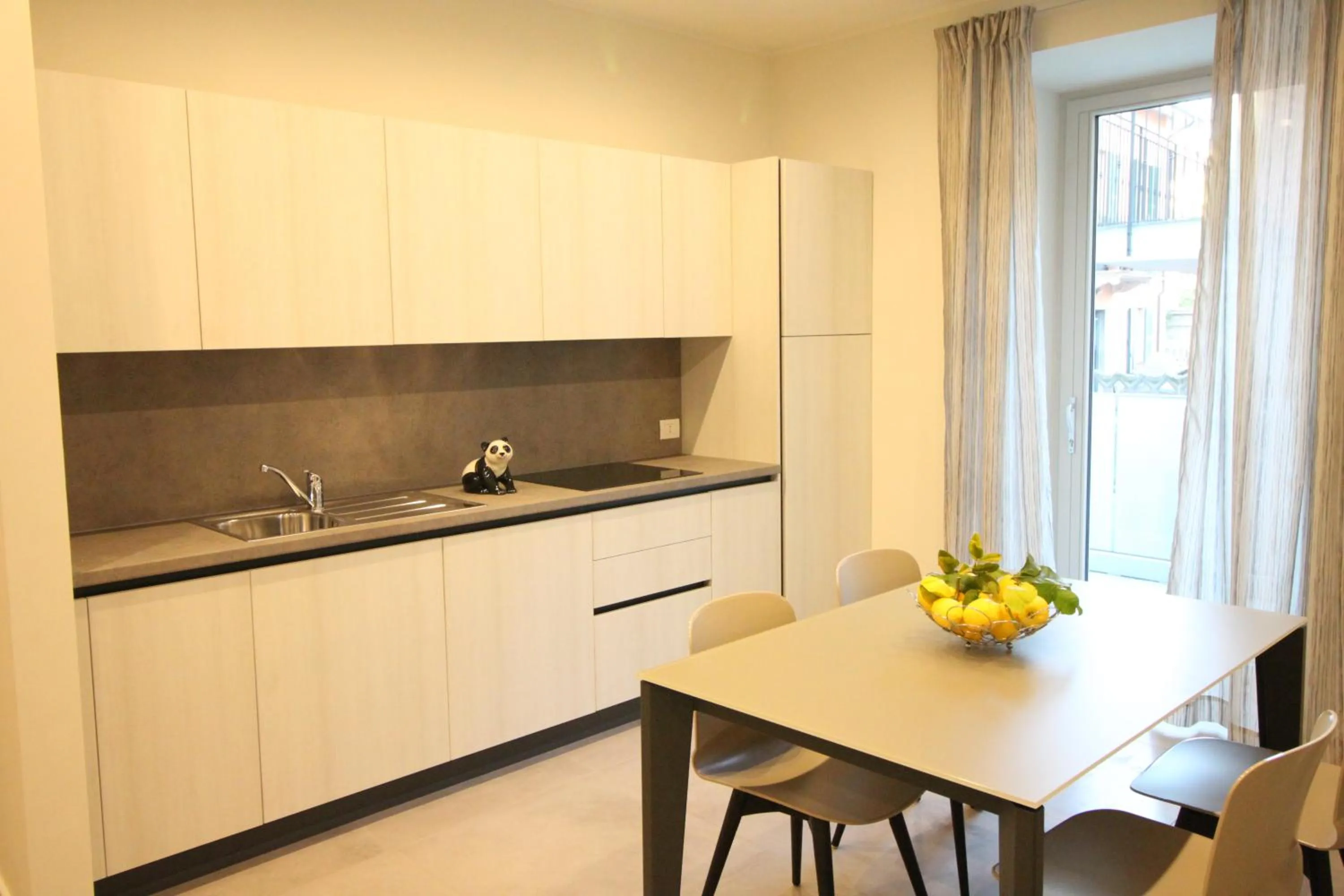 Kitchen or kitchenette in Casa Vacanze Residence Ideale Suites and Apartments
