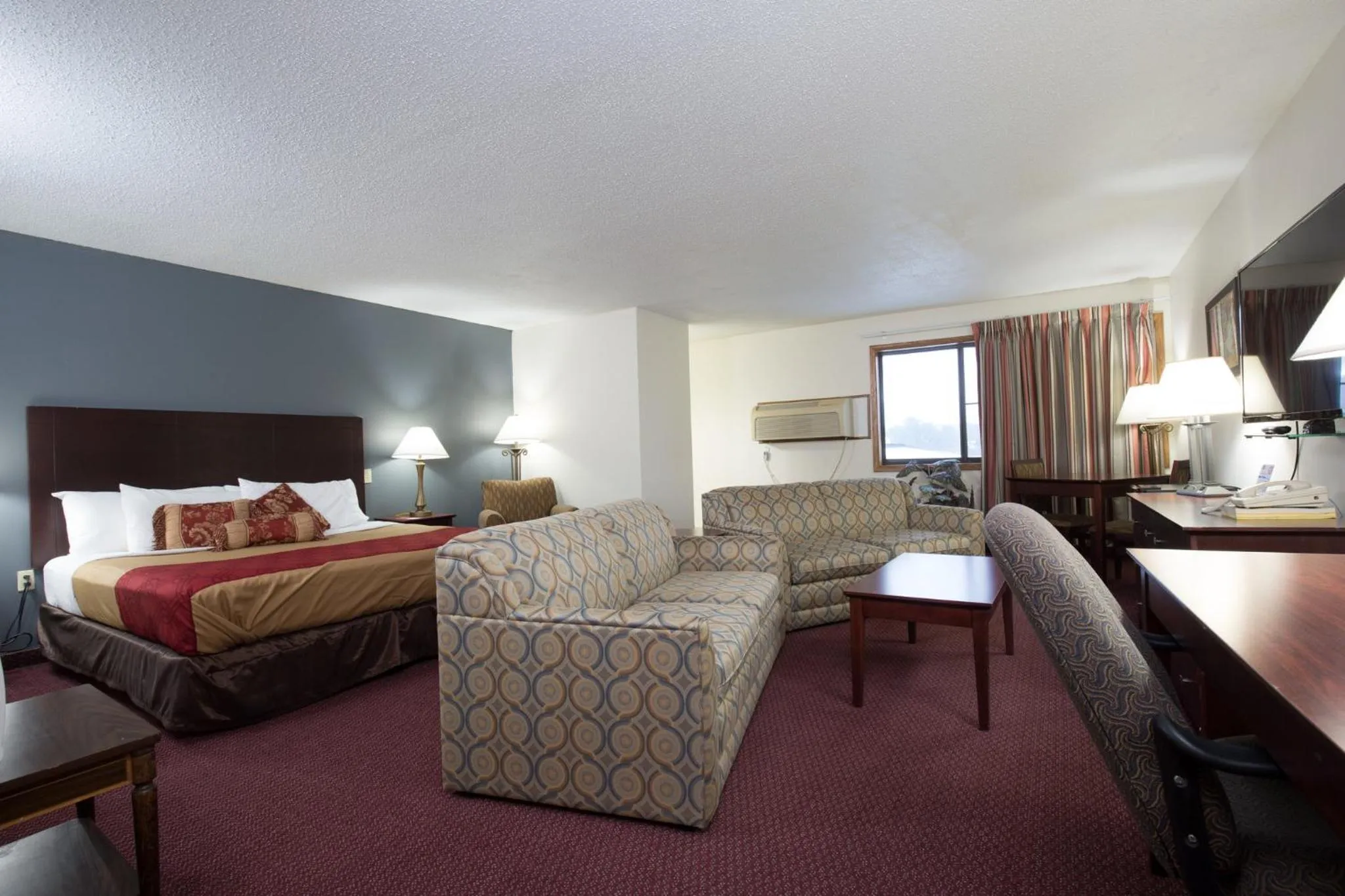 Bedroom, Bed in Travelodge by Wyndham Merrill