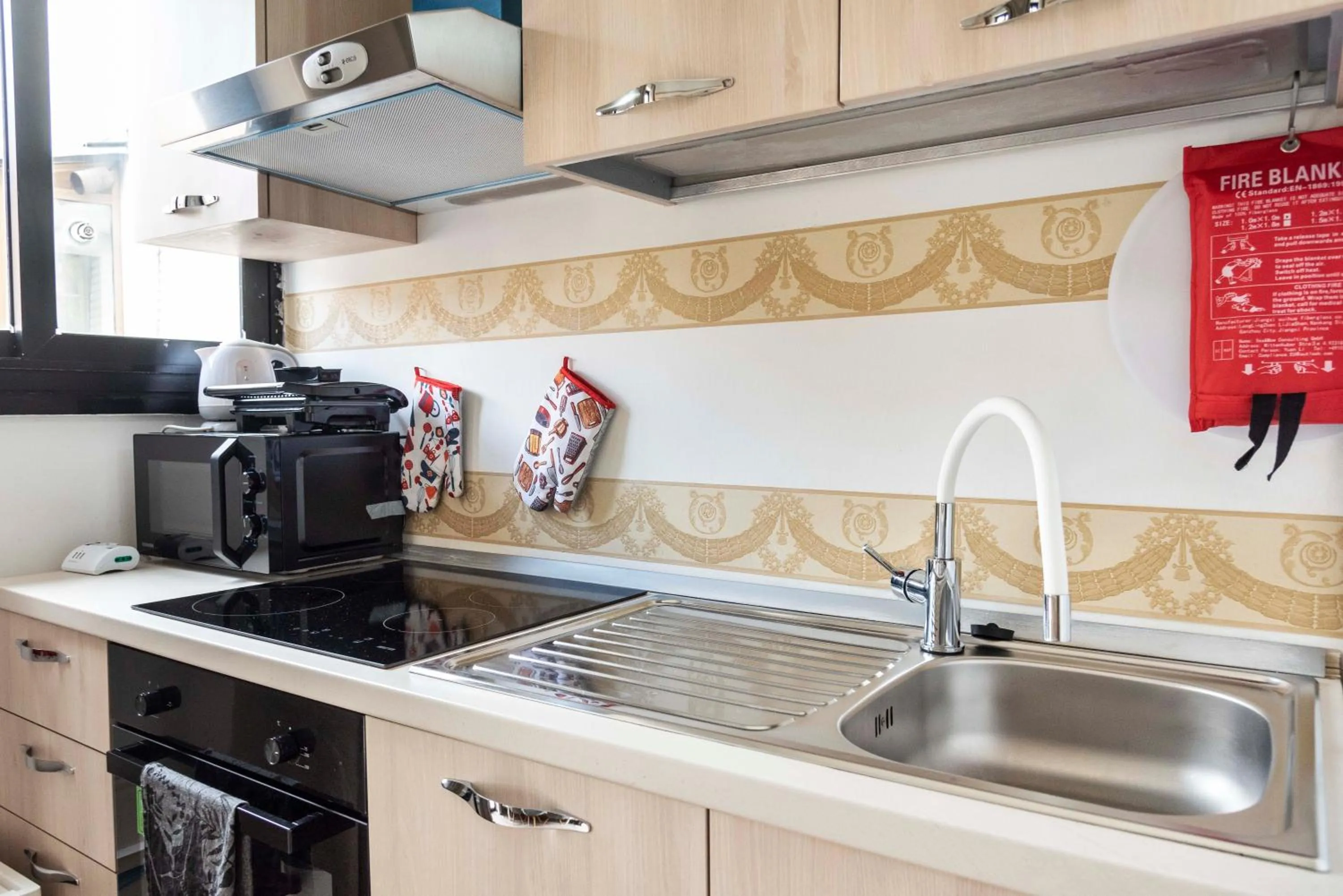 Kitchen or kitchenette in Merulana Suite S.Peter