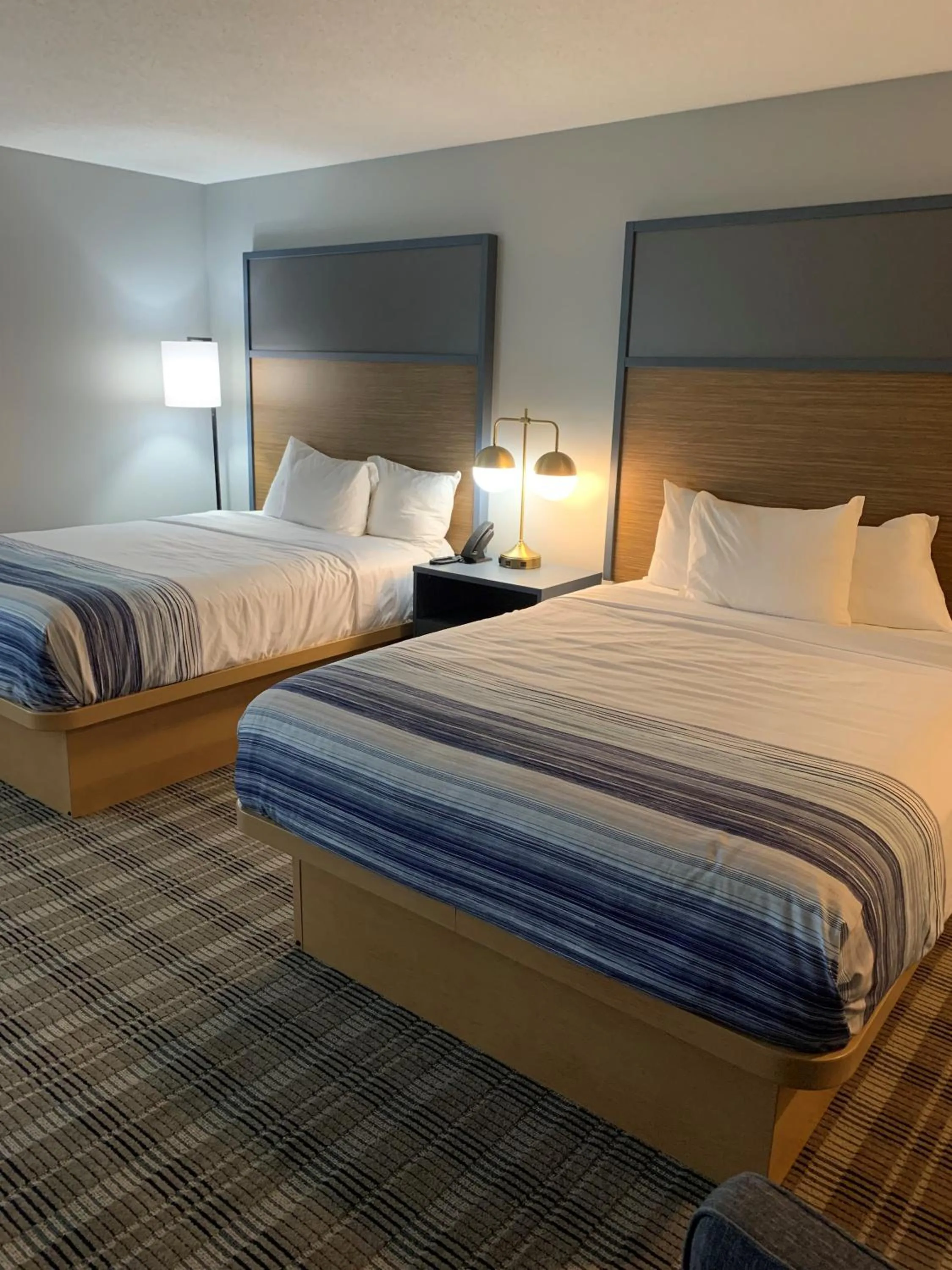 Bedroom, Bed in AmericInn by Wyndham Marshfield