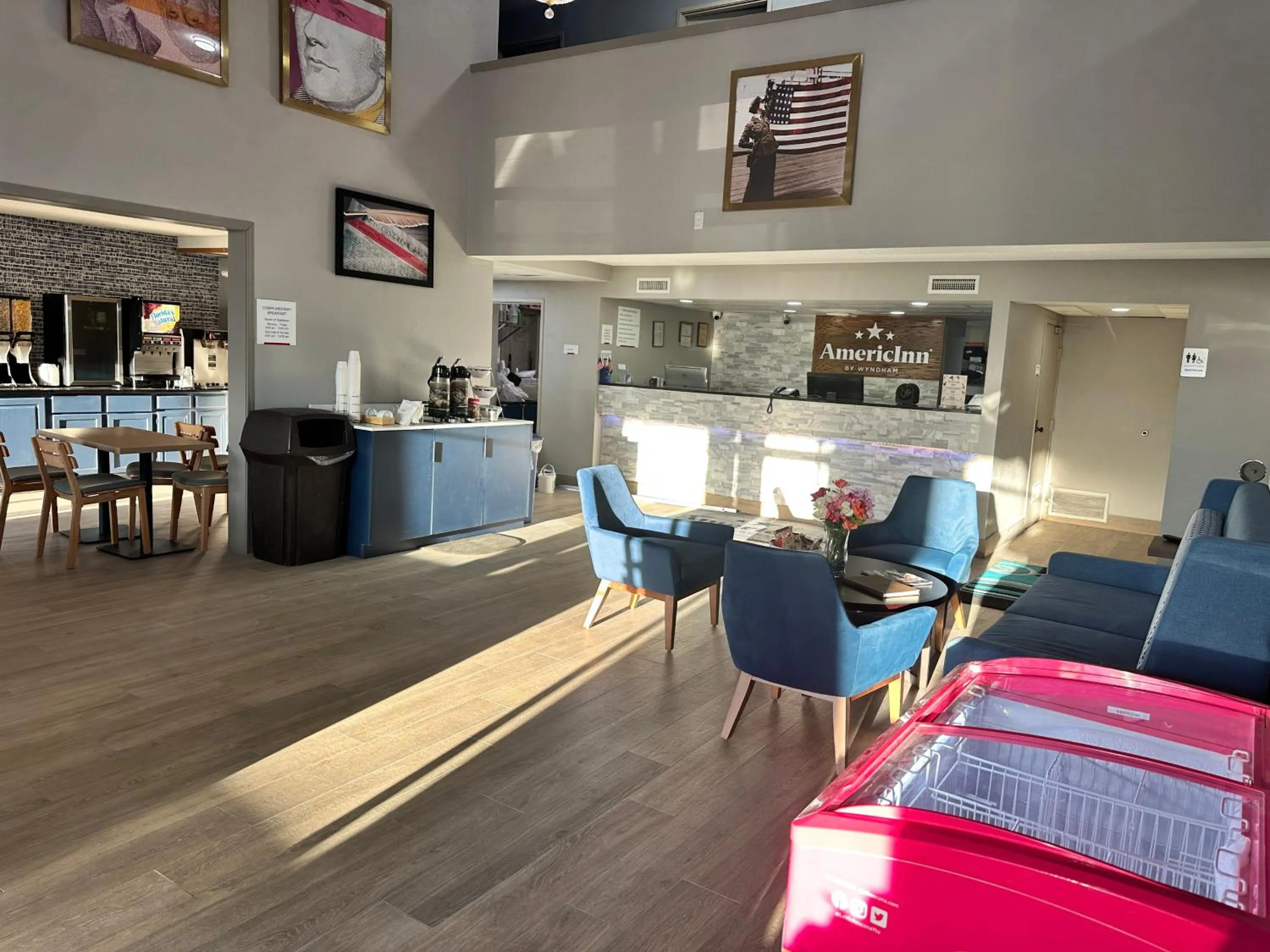 Seating area in AmericInn by Wyndham Reedsburg