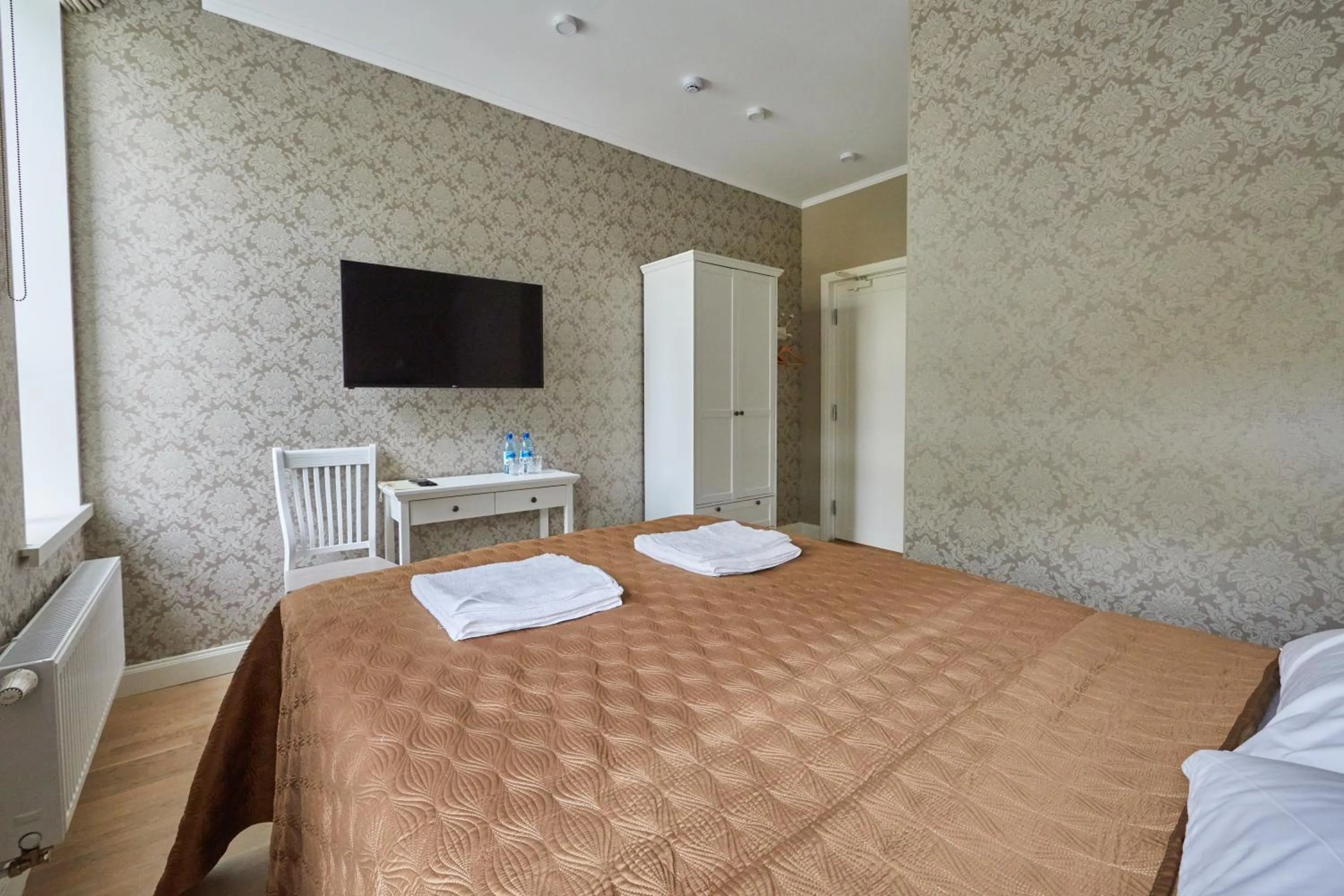 Bed in Rohuaia Apartments