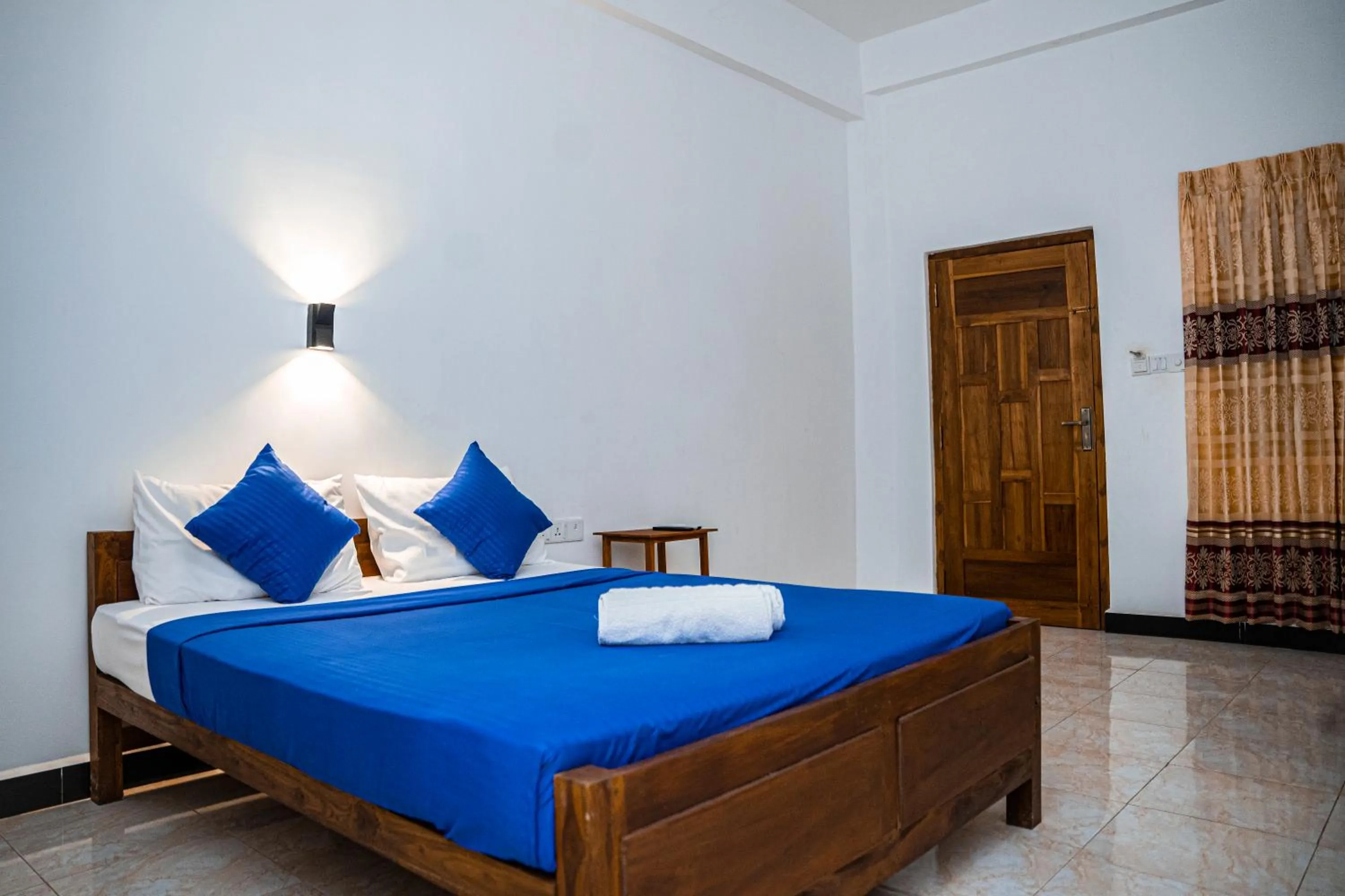 Bed in Theevanni Resort