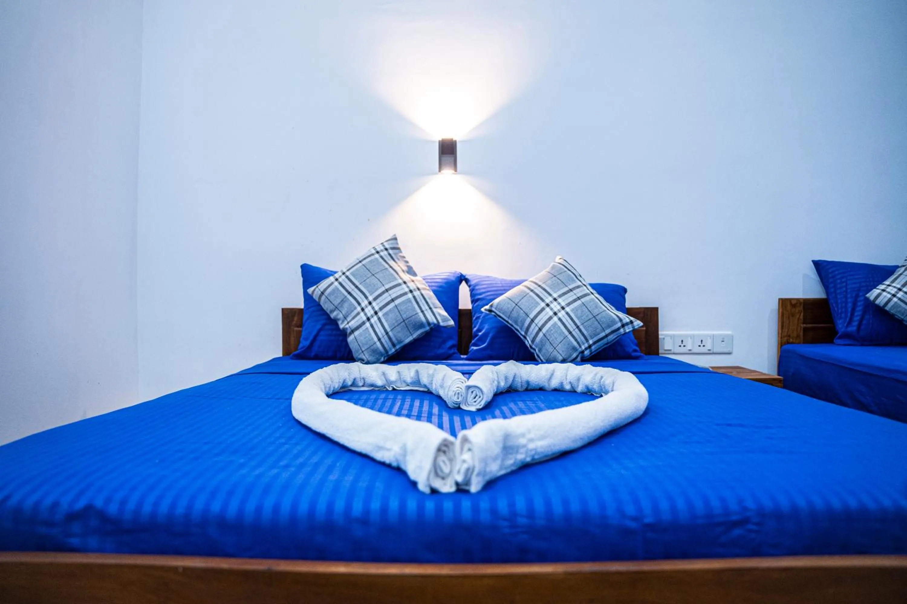 Bed in Theevanni Resort