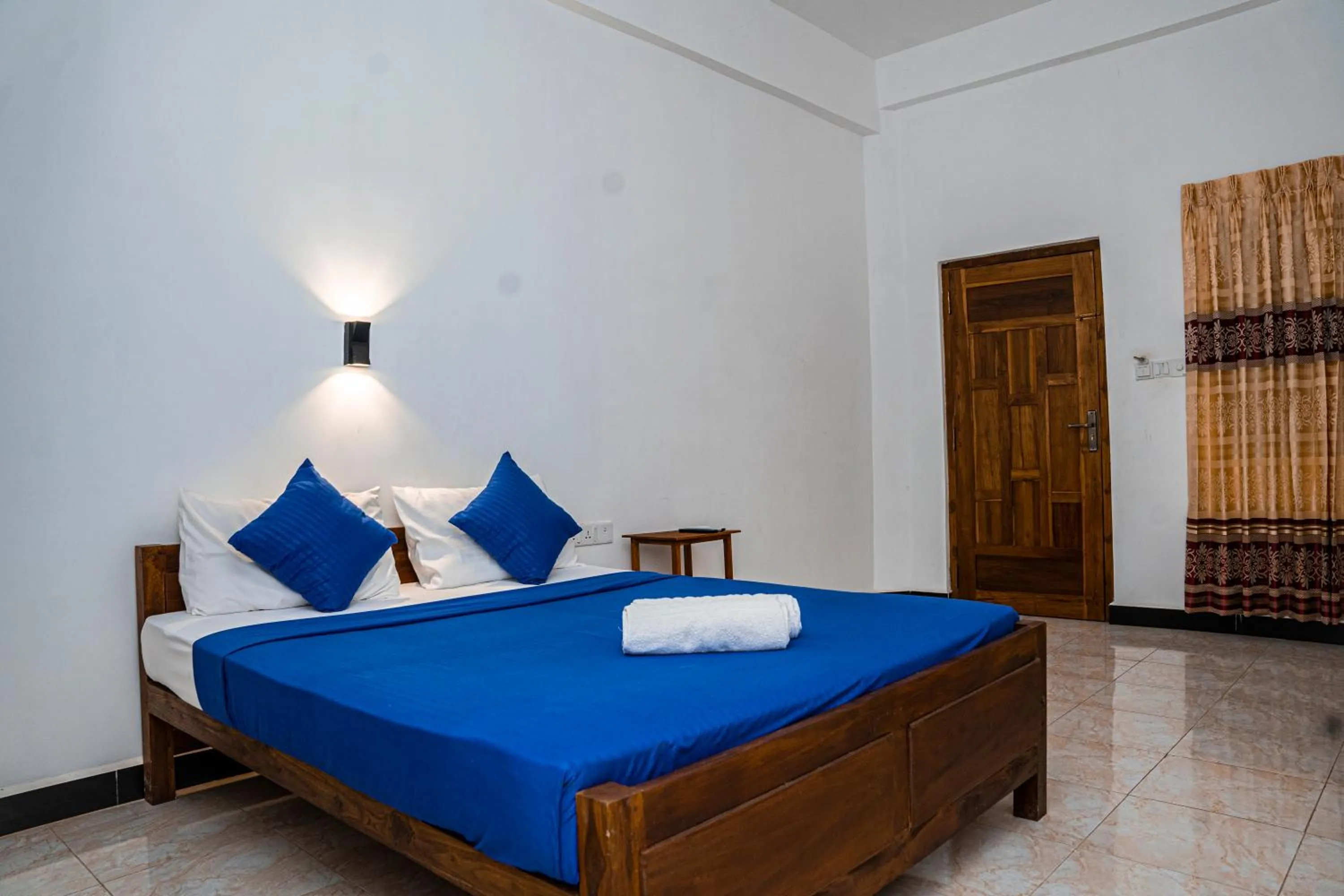 Bed in Theevanni Resort