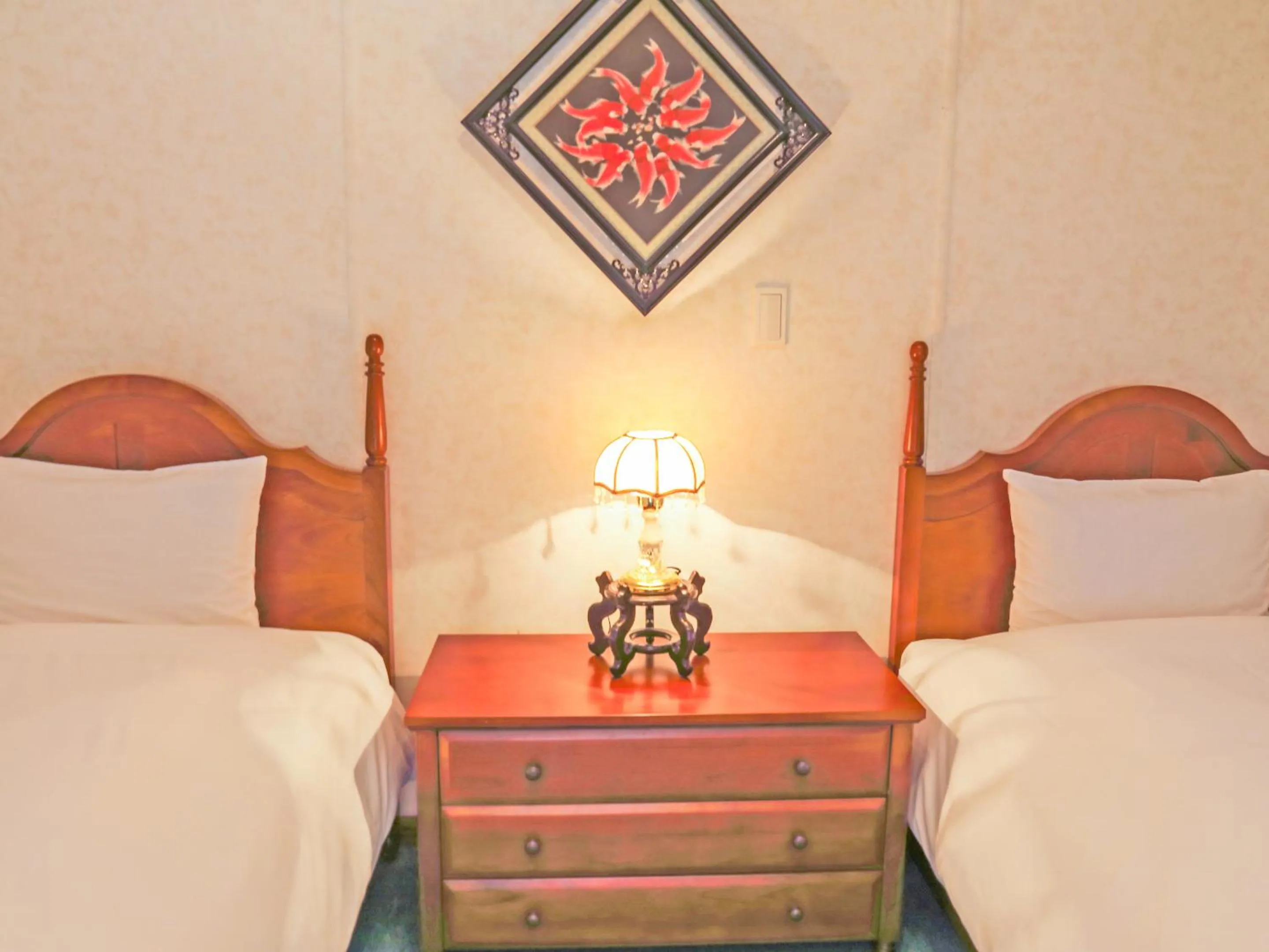 Bed in コテージスターハウス今帰仁