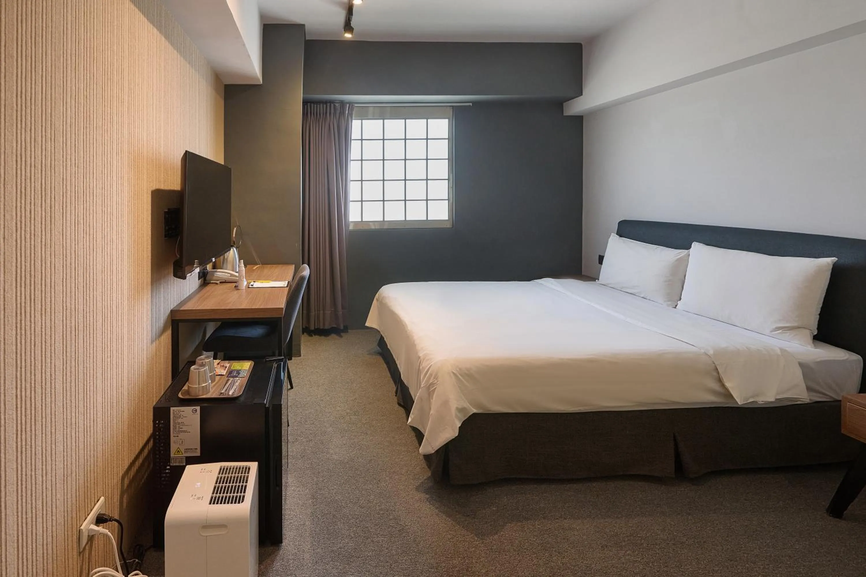 Bed in Doudian DDiNN Hotel