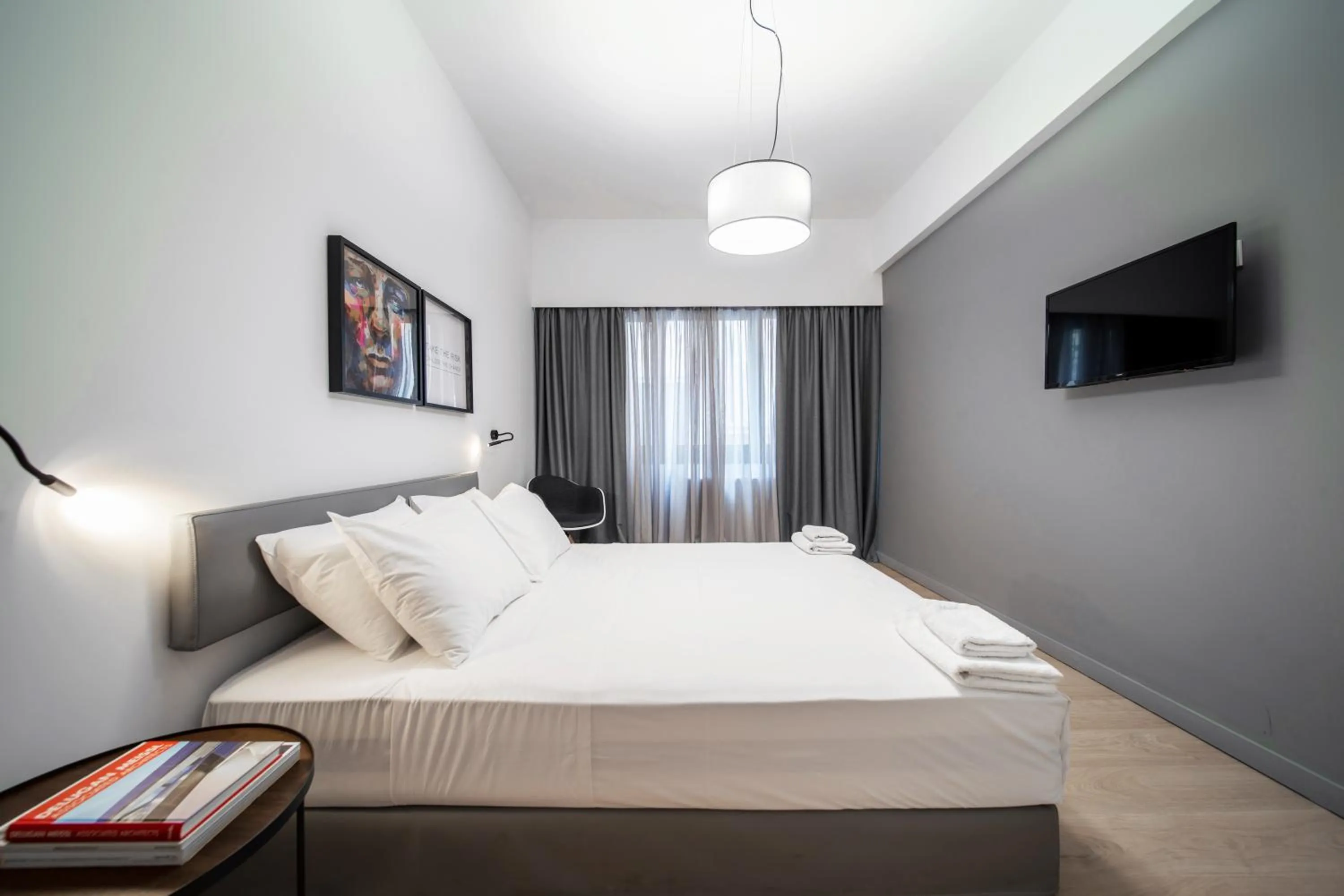 Bed in Heritage Boutique Apartments