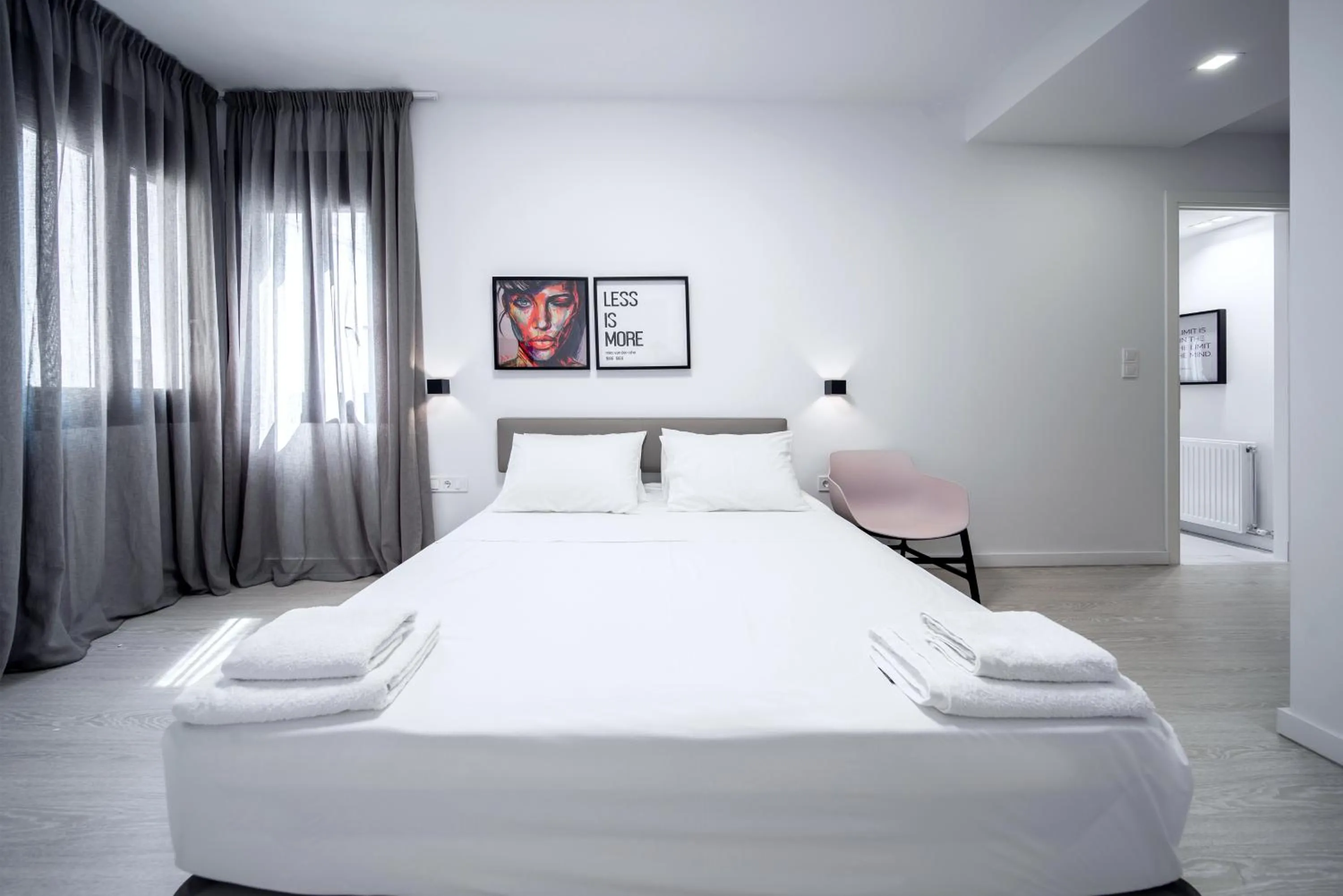 Bed in Heritage Boutique Apartments