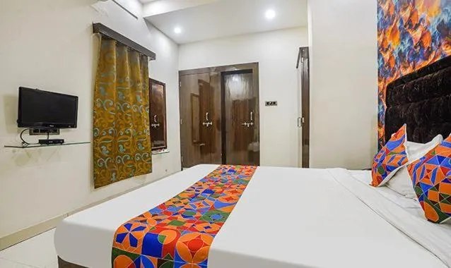 Photo of the whole room, Bed in The JK Hotel Nr Railway Station