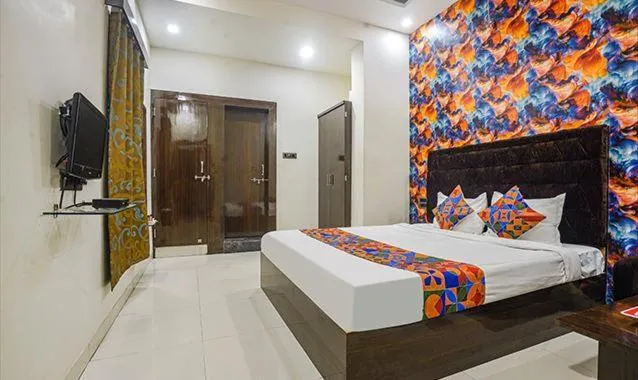 Photo of the whole room, Bed in The JK Hotel Nr Railway Station