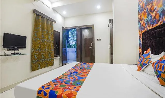 Photo of the whole room, Bed in The JK Hotel Nr Railway Station