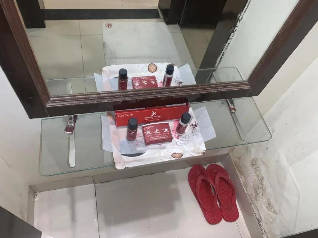 Bathroom in The JK Hotel Nr Railway Station