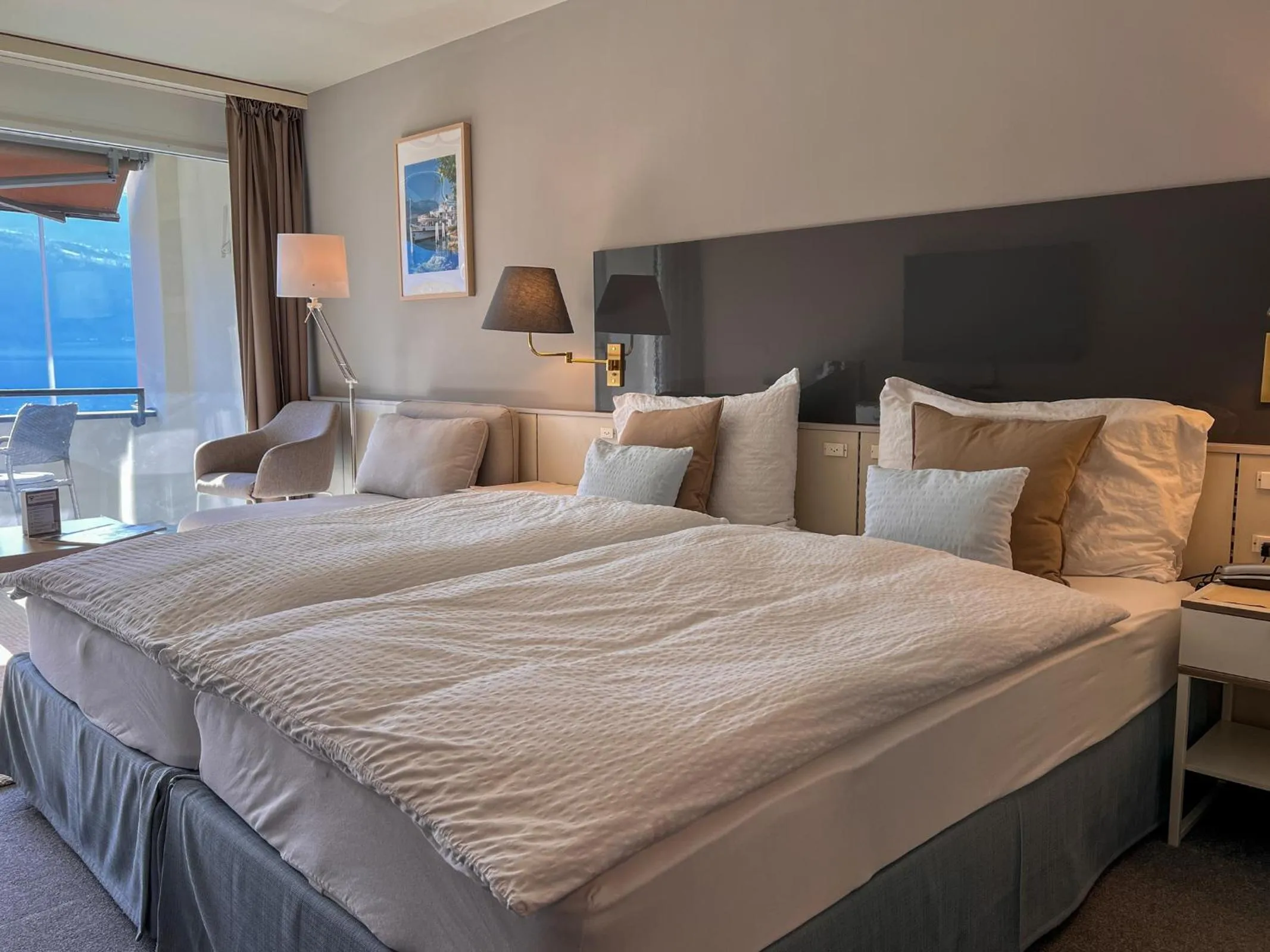 Bed in Seehotel Riviera at Lake Lucerne