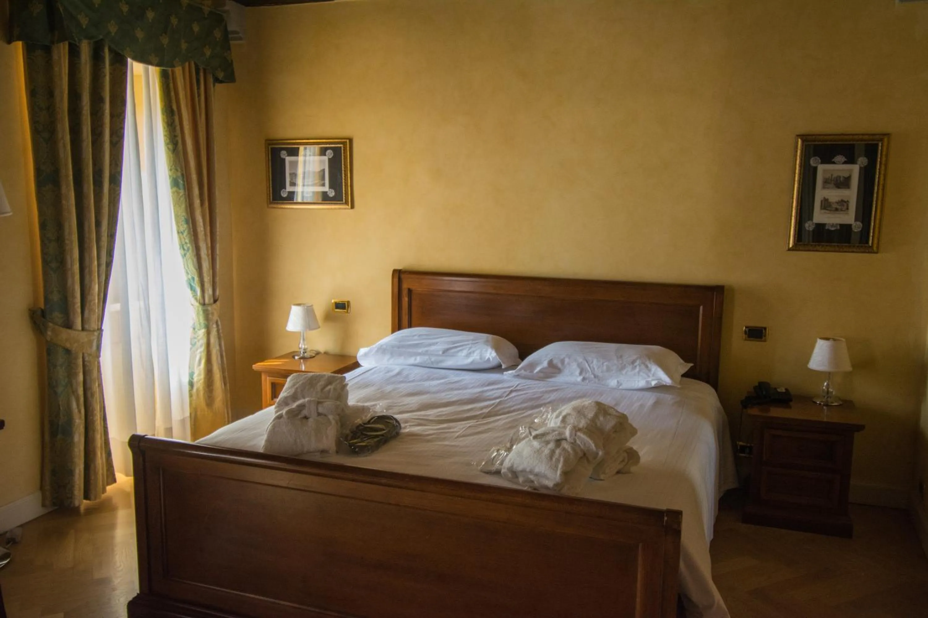 Bed in Relais La Colombara Spa & Wellness