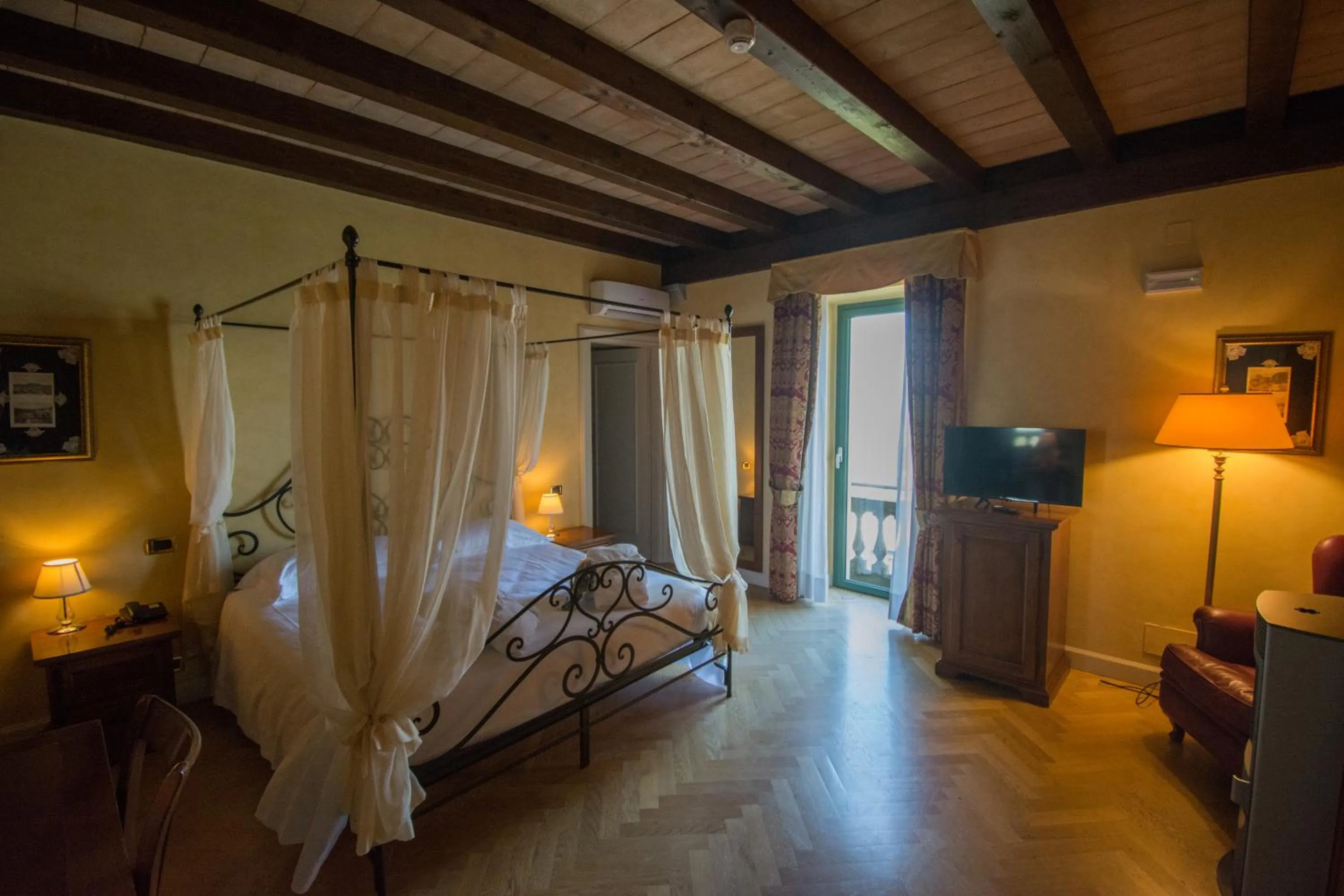 Bed in Relais La Colombara Spa & Wellness