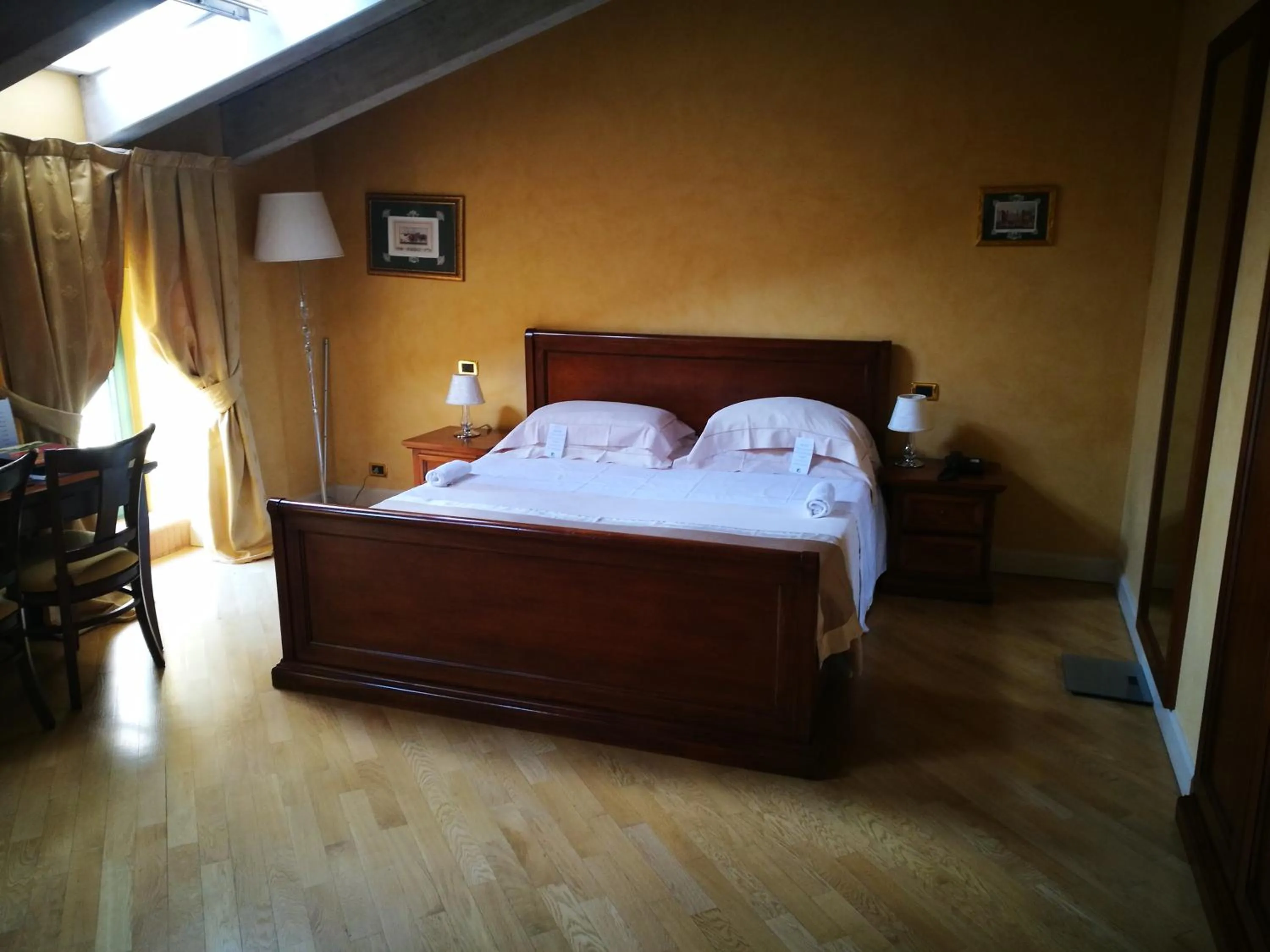 Bed in Relais La Colombara Spa & Wellness