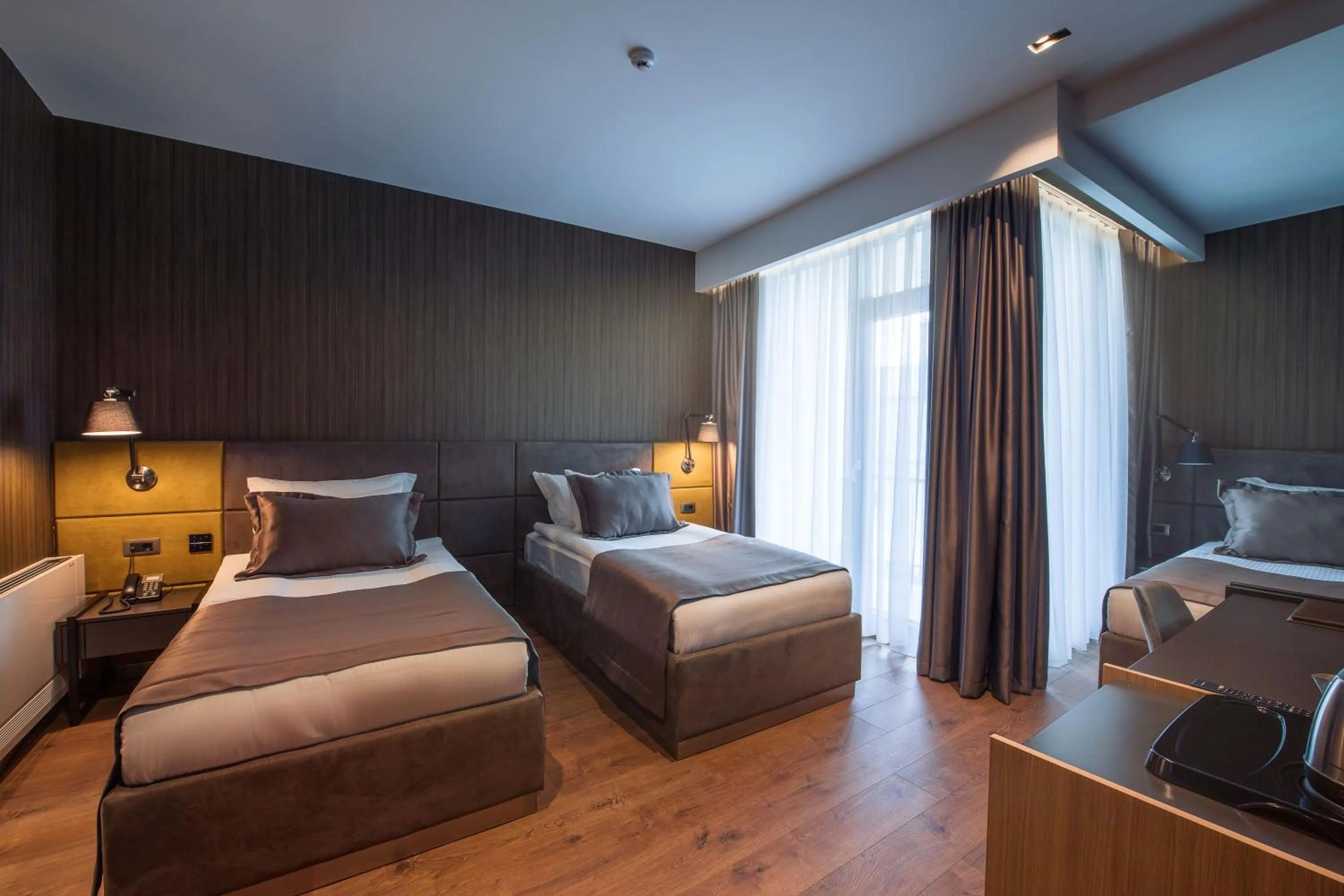 Photo of the whole room, Bed in Seraphine Plaza