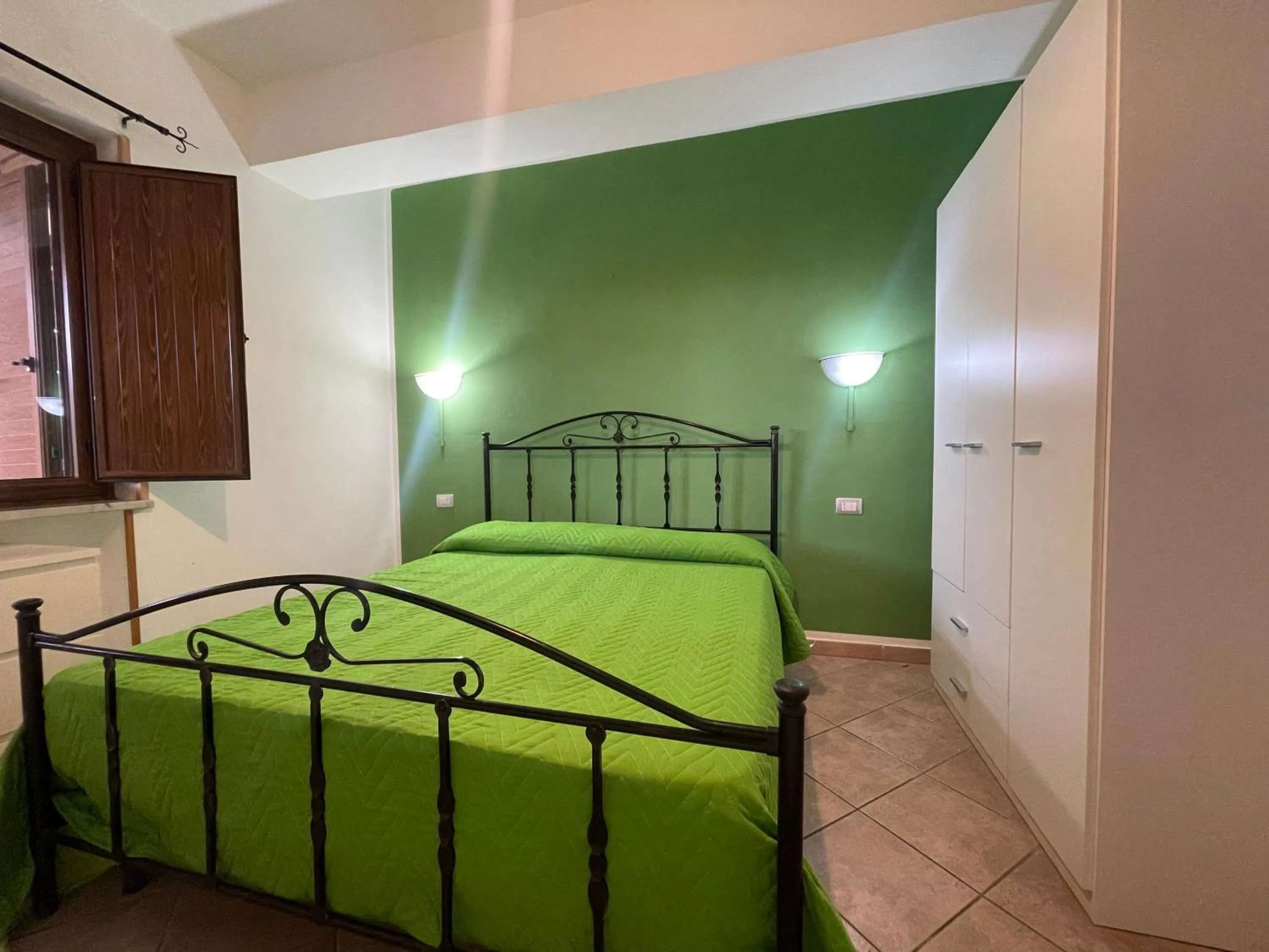 Bedroom, Bed in Appartamenti Pousada Michelino