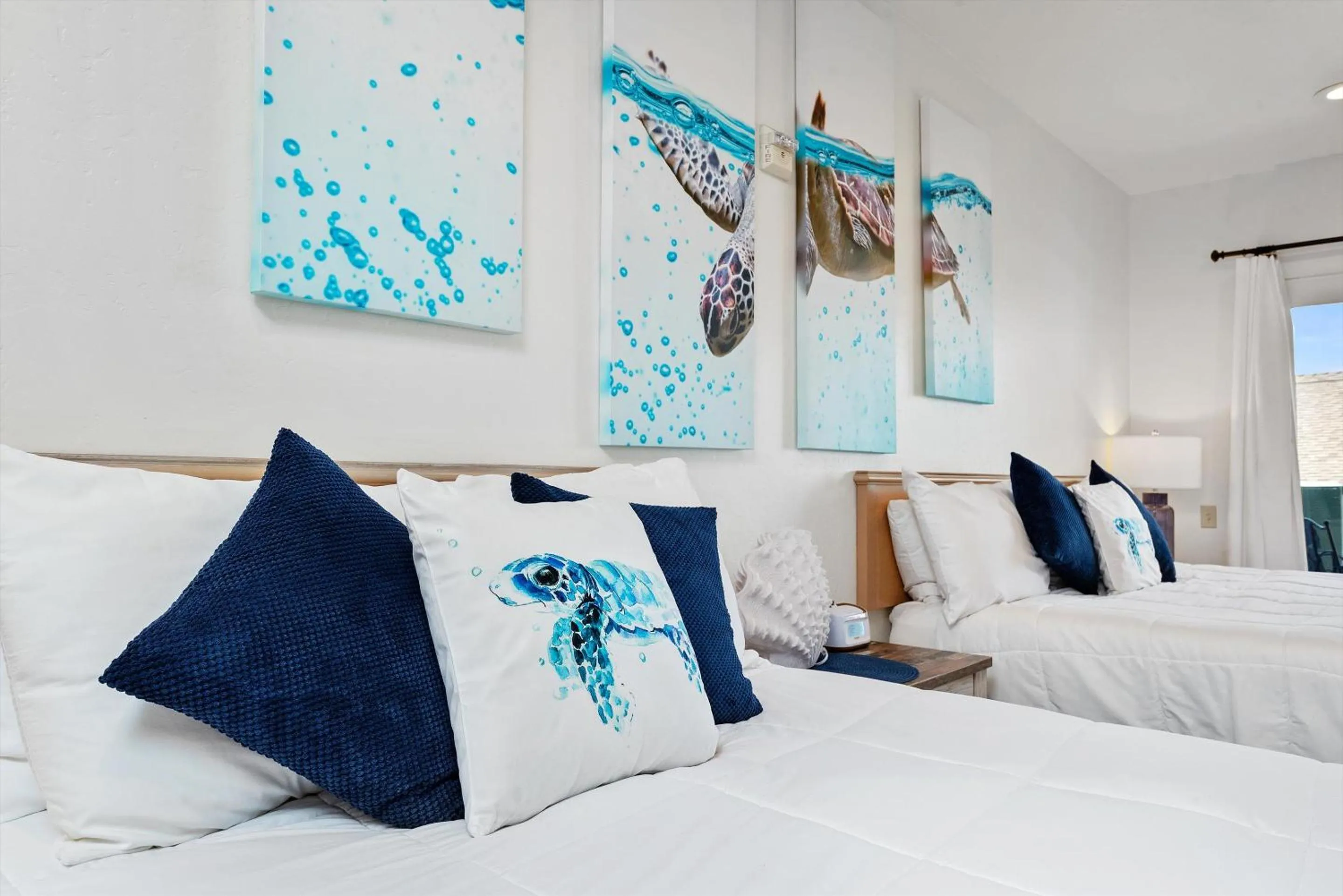 Bed in Beach House Inn & Suites