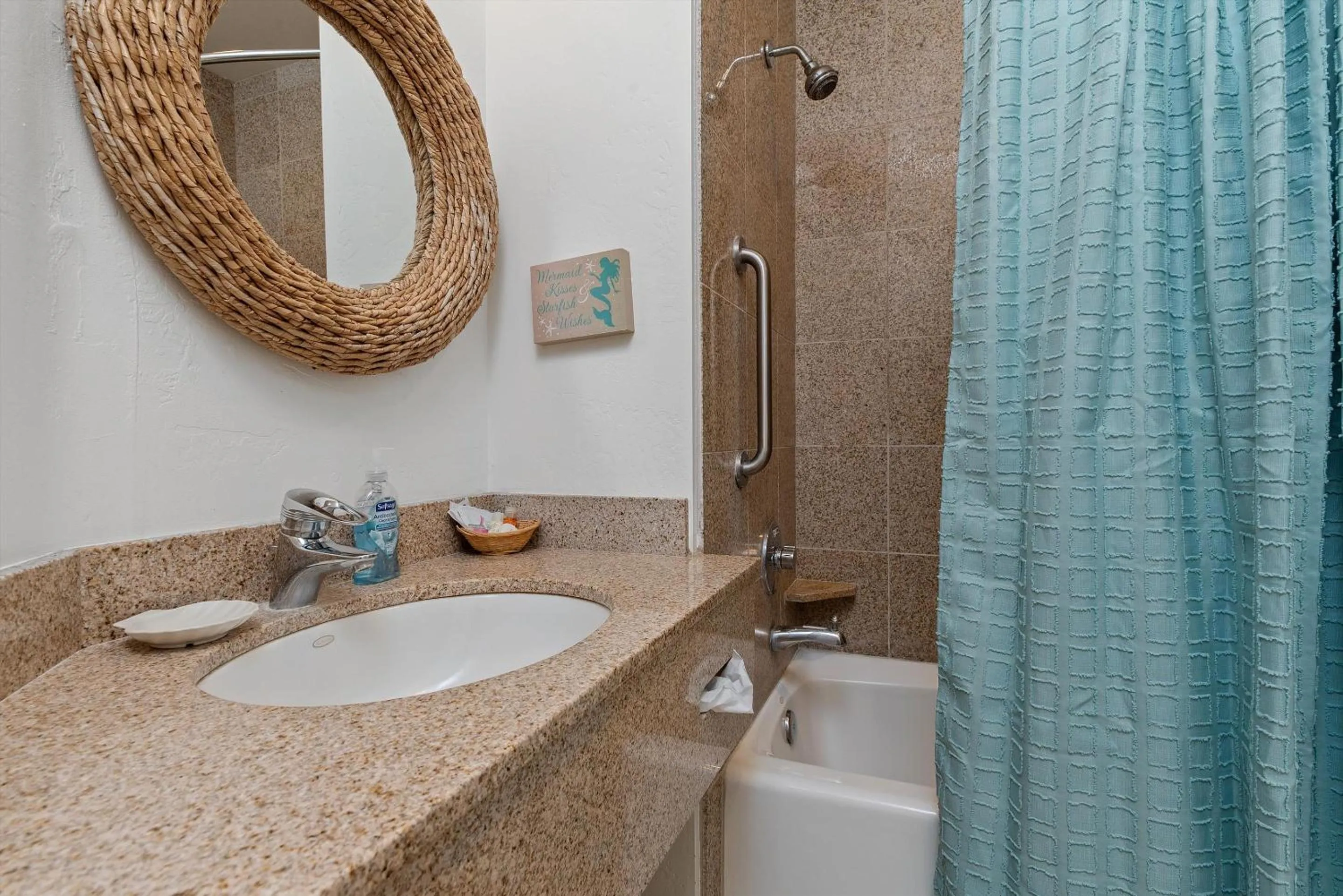 Bathroom in Beach House Inn & Suites