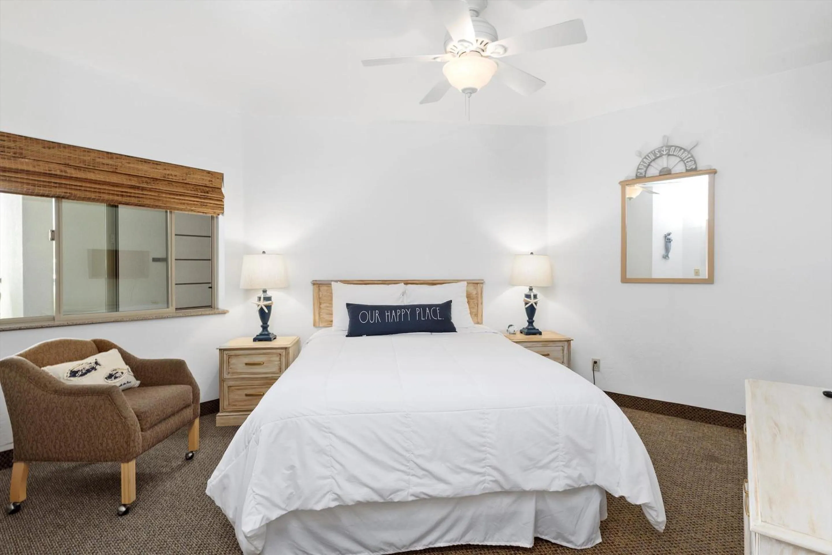 Bed in Beach House Inn & Suites