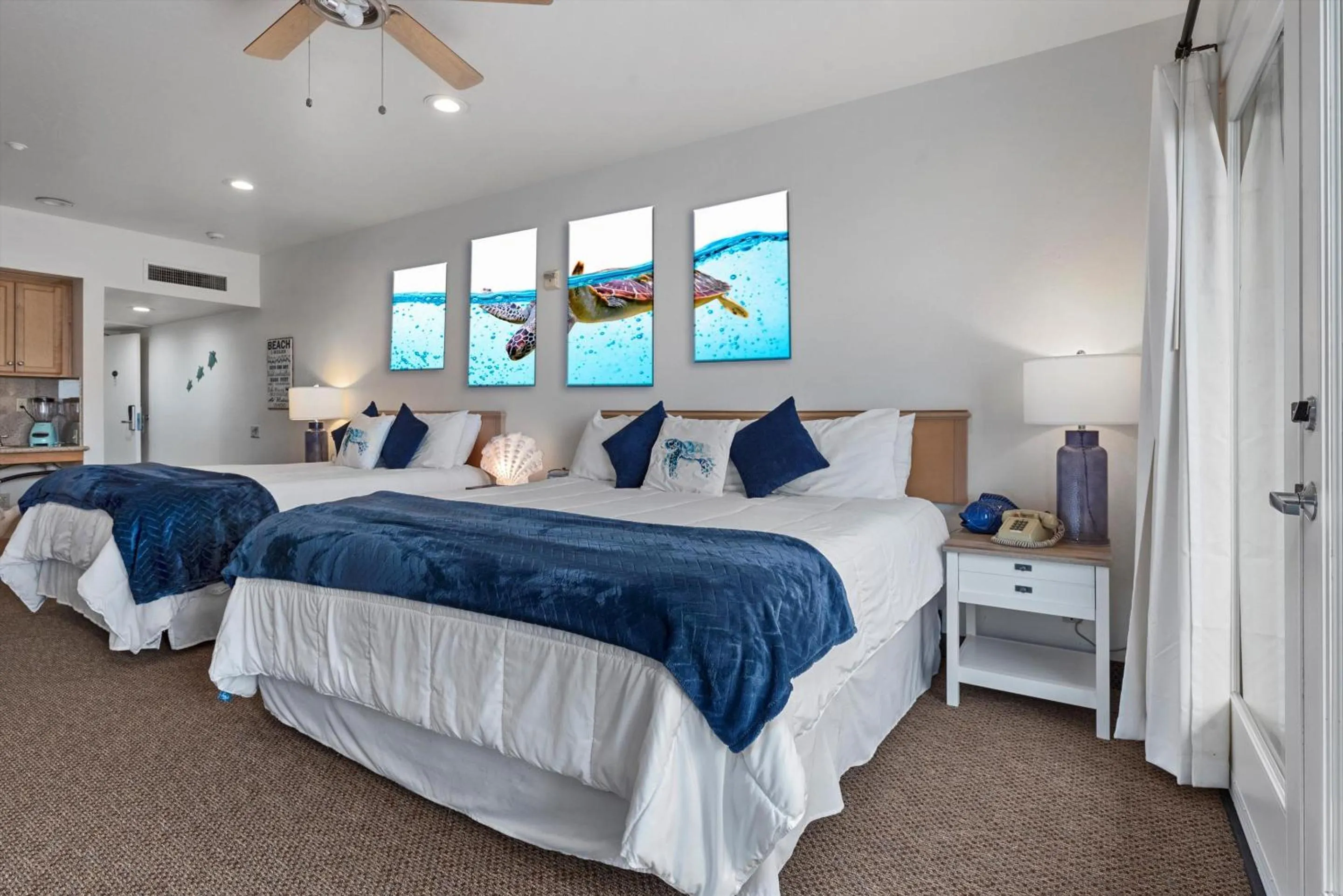 Bed in Beach House Inn & Suites