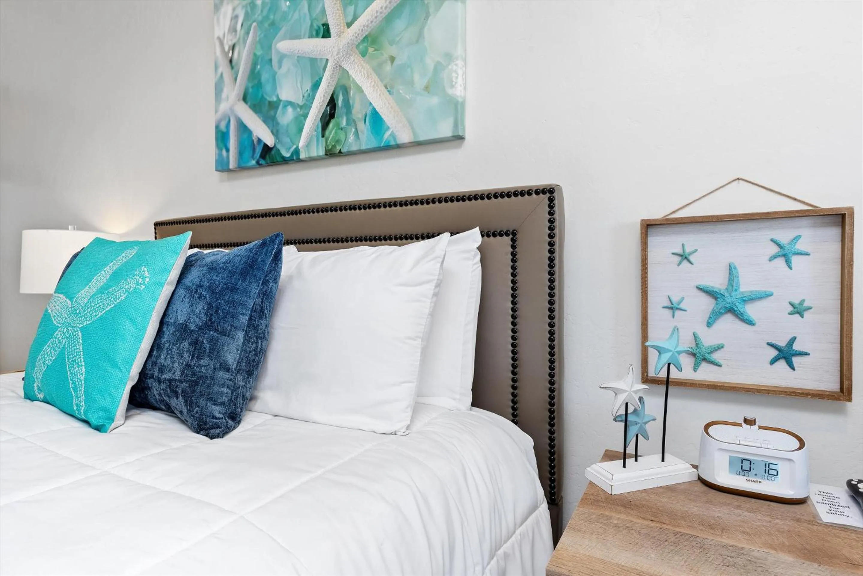 Bed in Beach House Inn & Suites