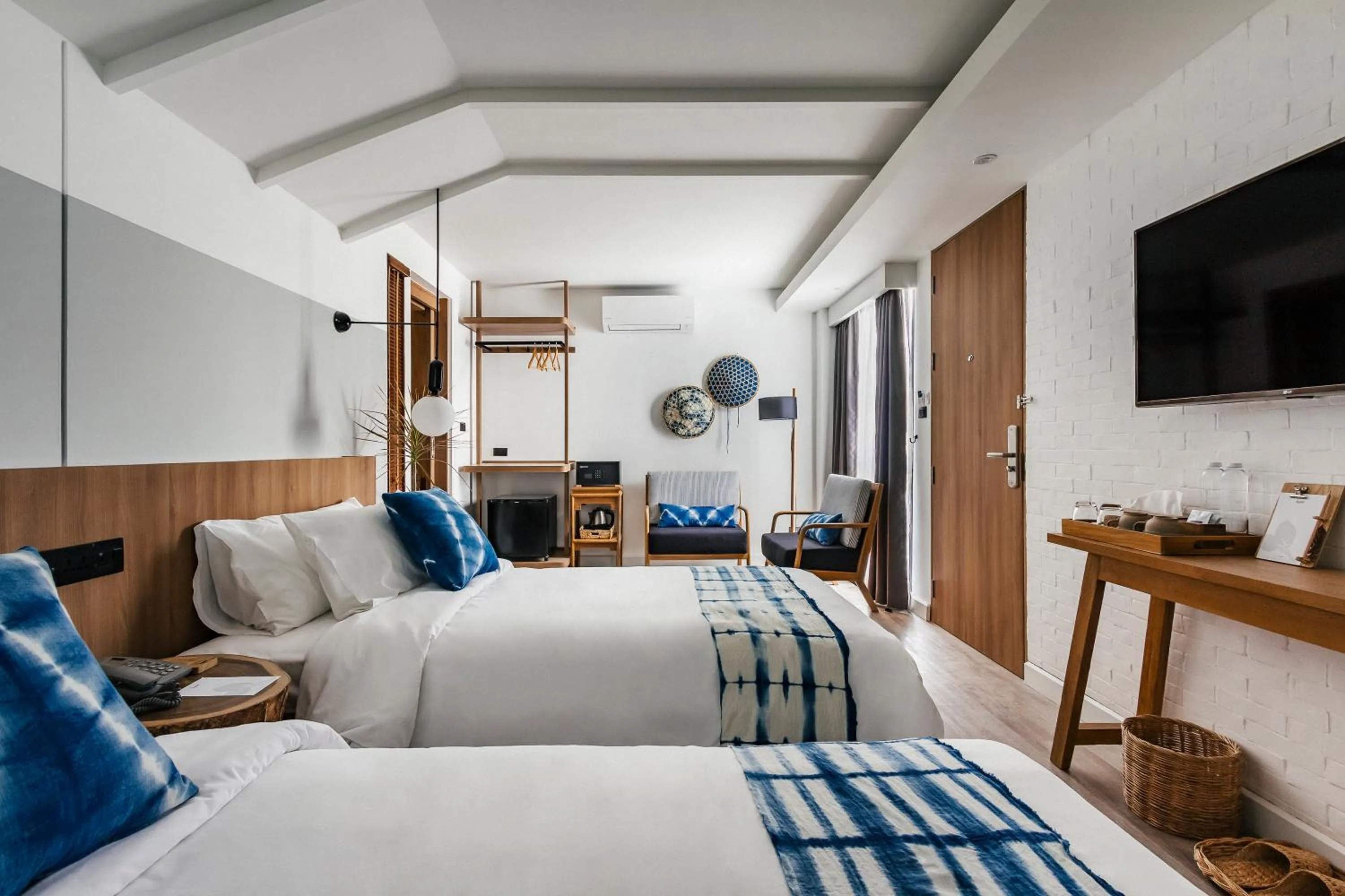 Bed in HOMM Boutique Hotel