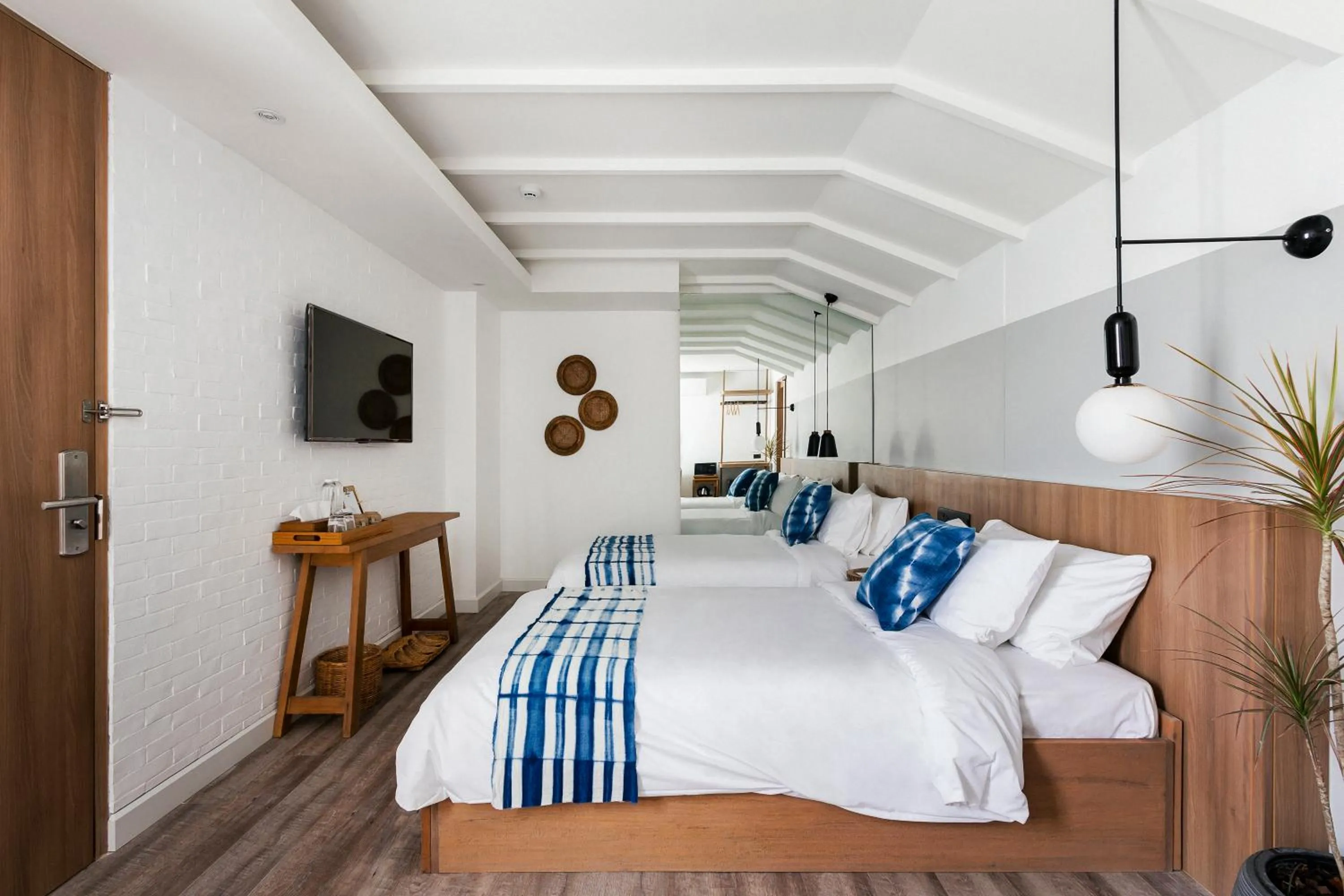 Bed in HOMM Boutique Hotel