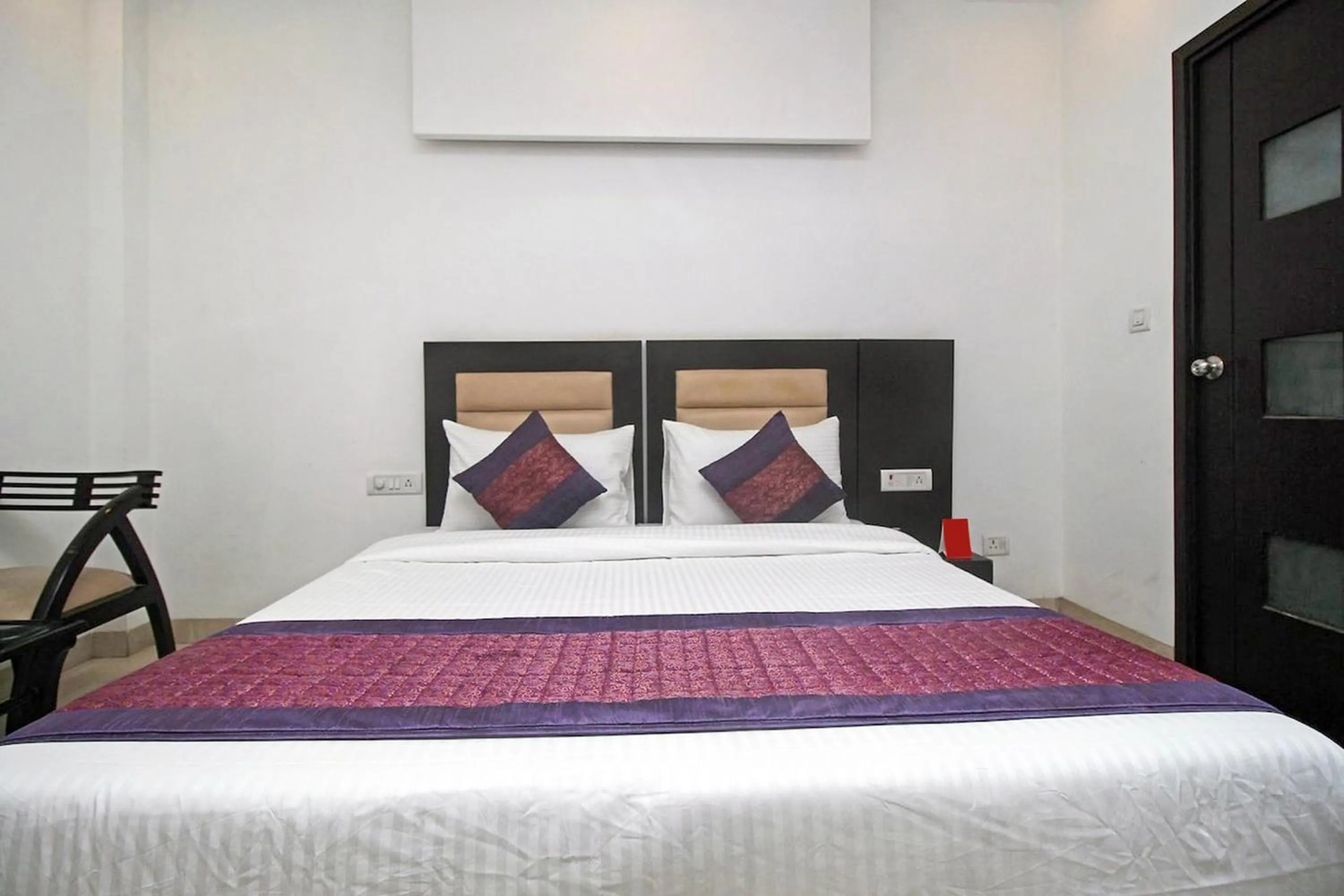 Bedroom in FabHotel Arihant Inn