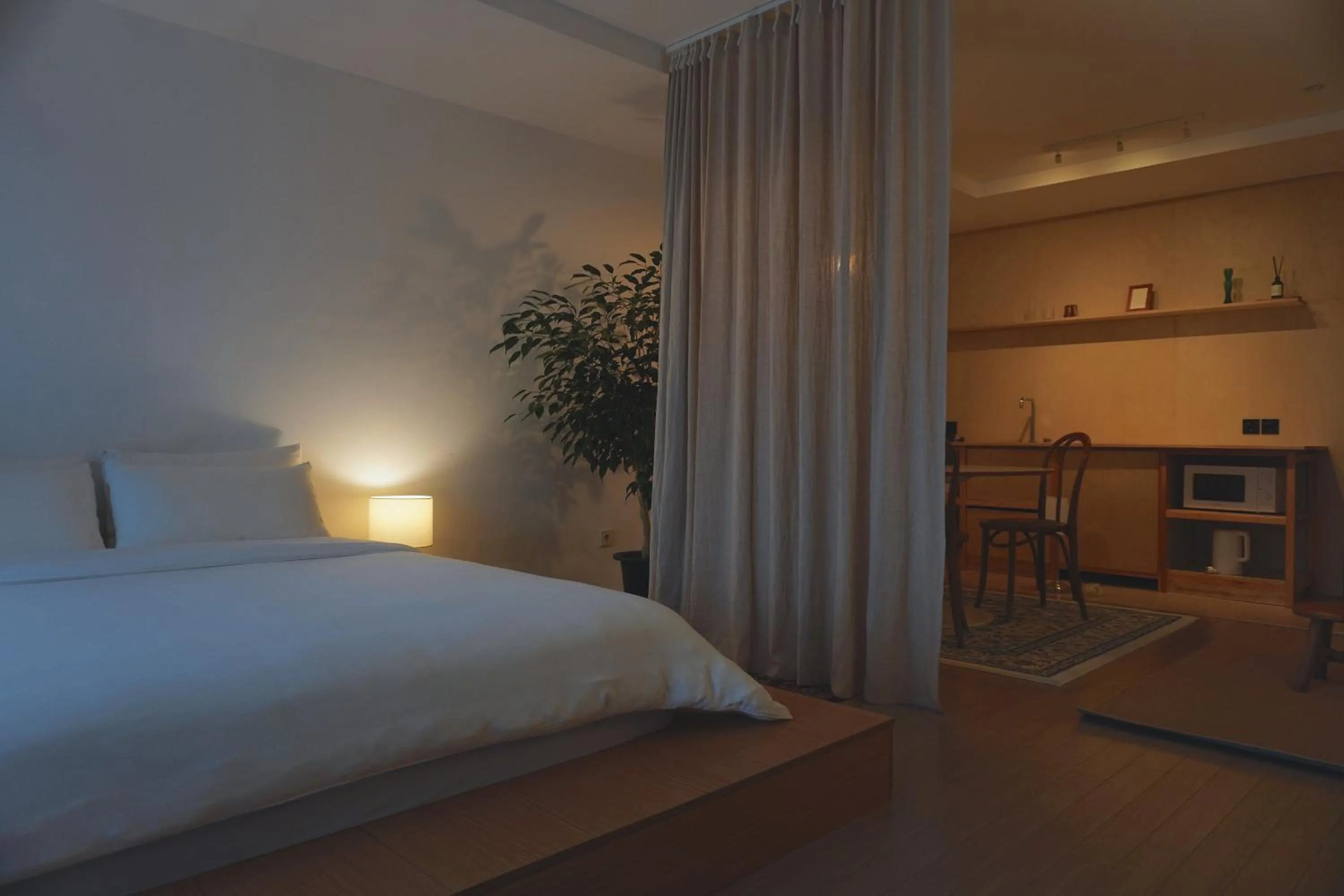 Bed in At corner resort & garden