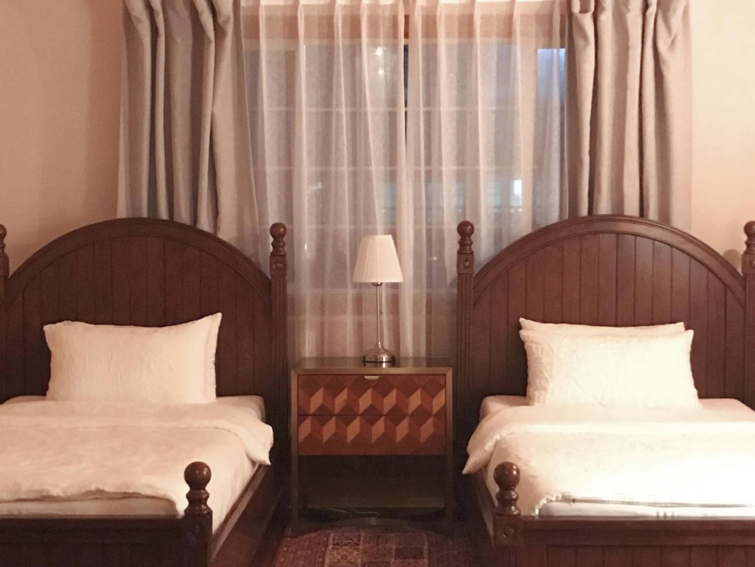 Bed in At corner resort & garden